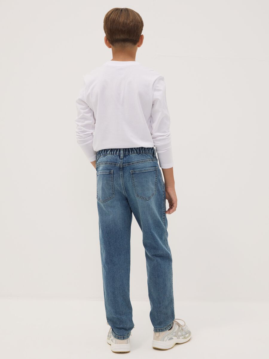 Blue stretch cotton jeans with elasticated waist for boys_1