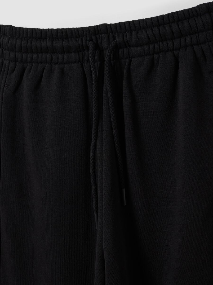Black barrel-fit cotton-blend joggers_5
