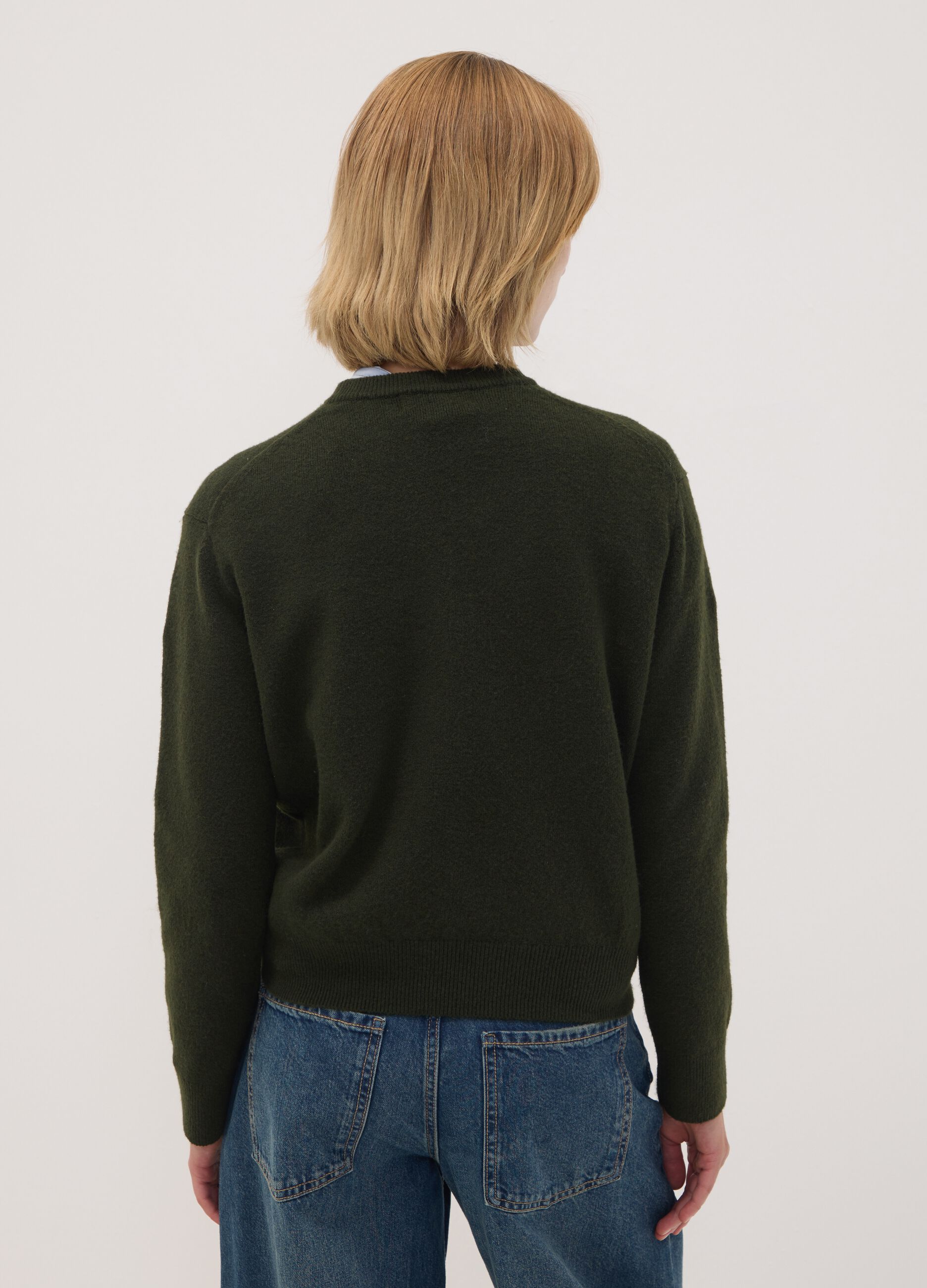 Maglia verde in lana elasticizzata a girocollo