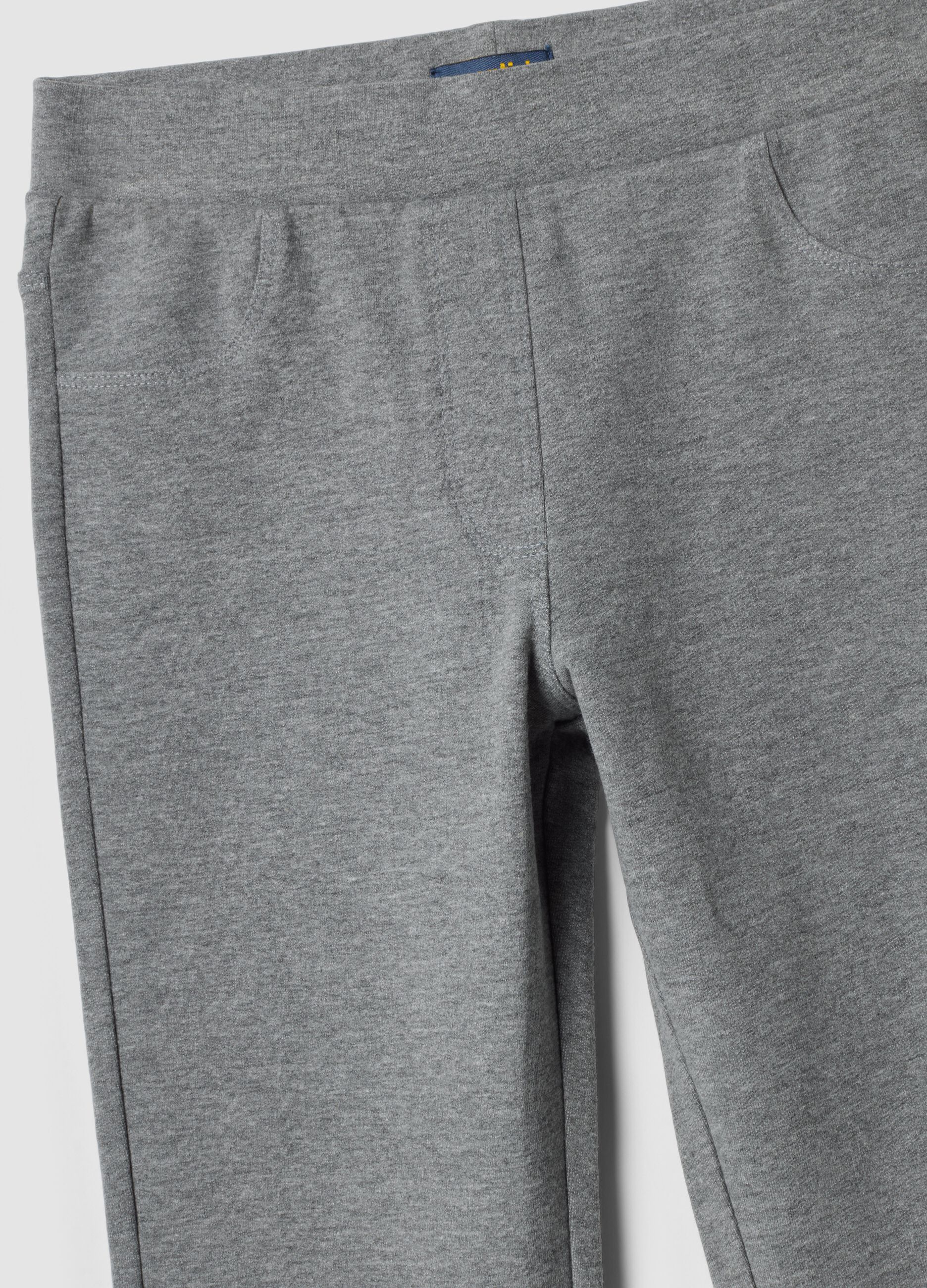 Pantaloni flare grigi in cotone organico e viscosa elasticizzata