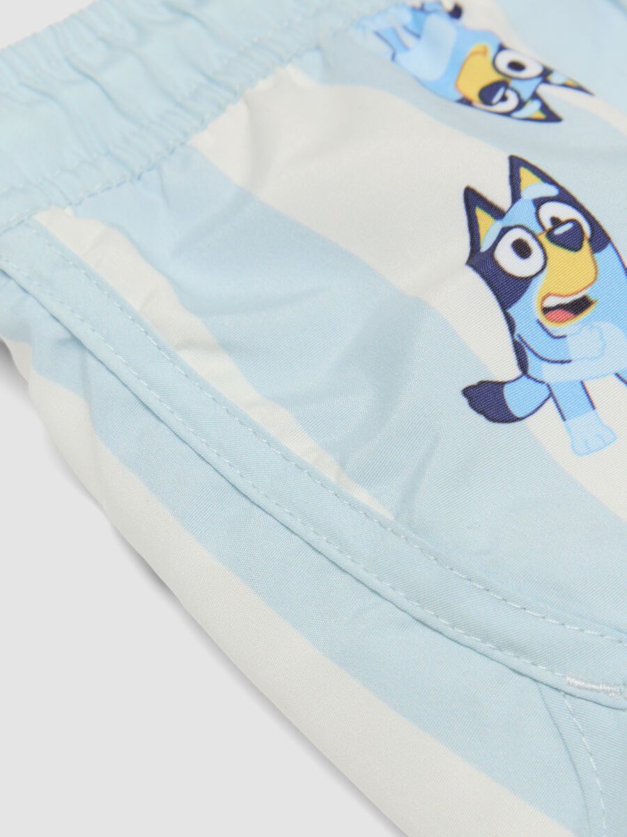Light blue striped Bluey print swim shorts for boys_3