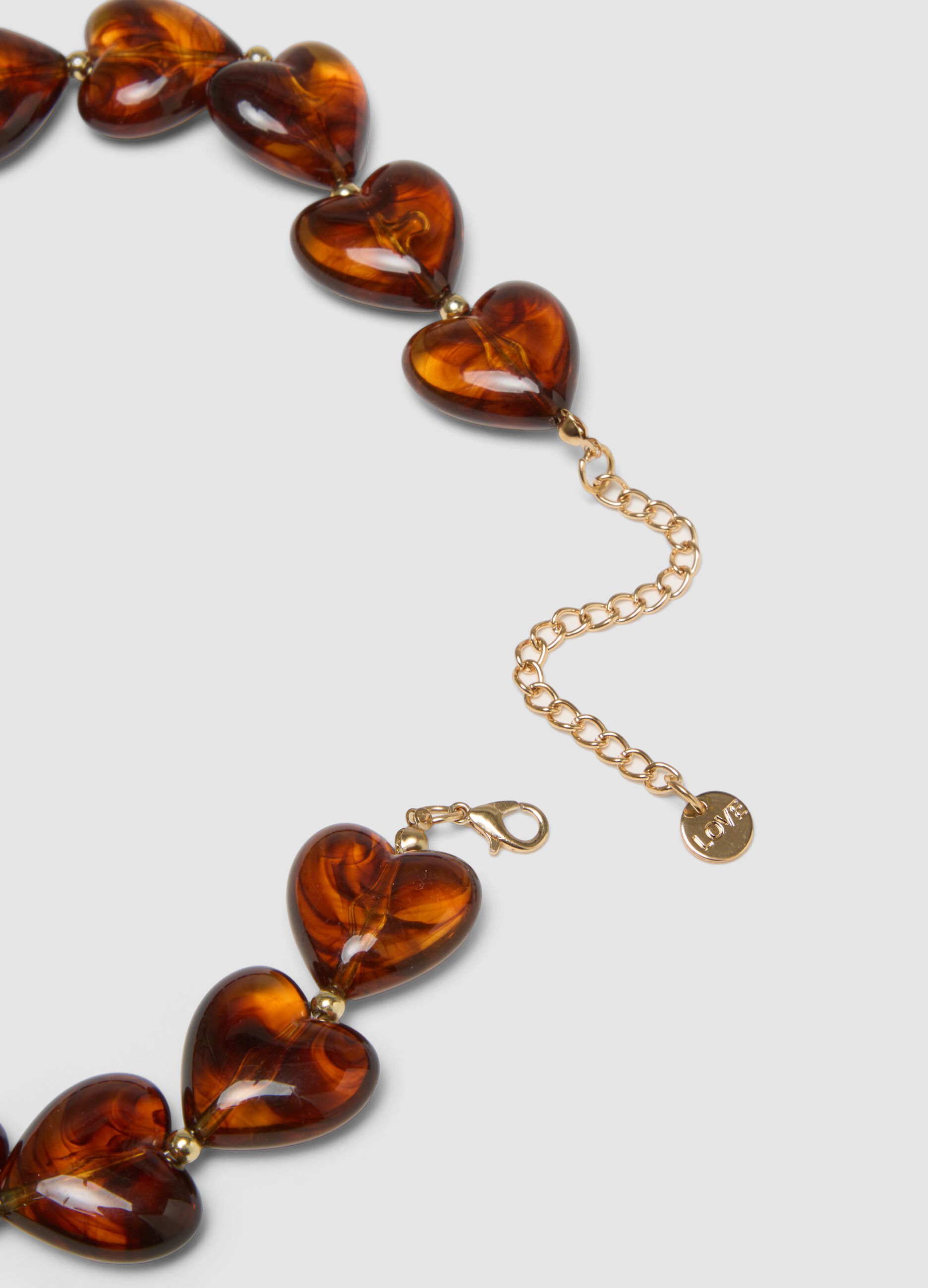 Orange necklace with marbled-effect hearts