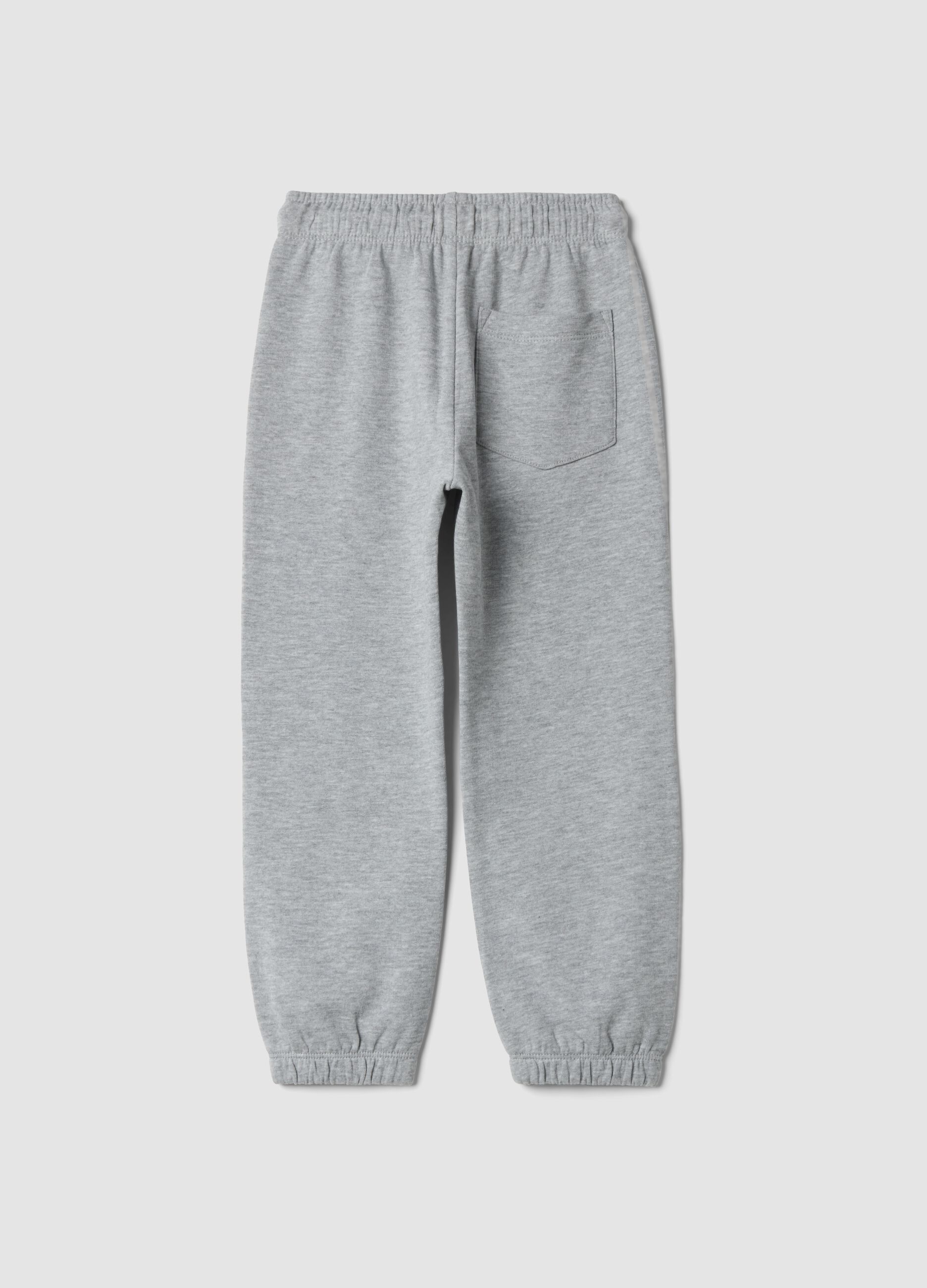 Pantaloni jogger grigi in puro cotone con stampa