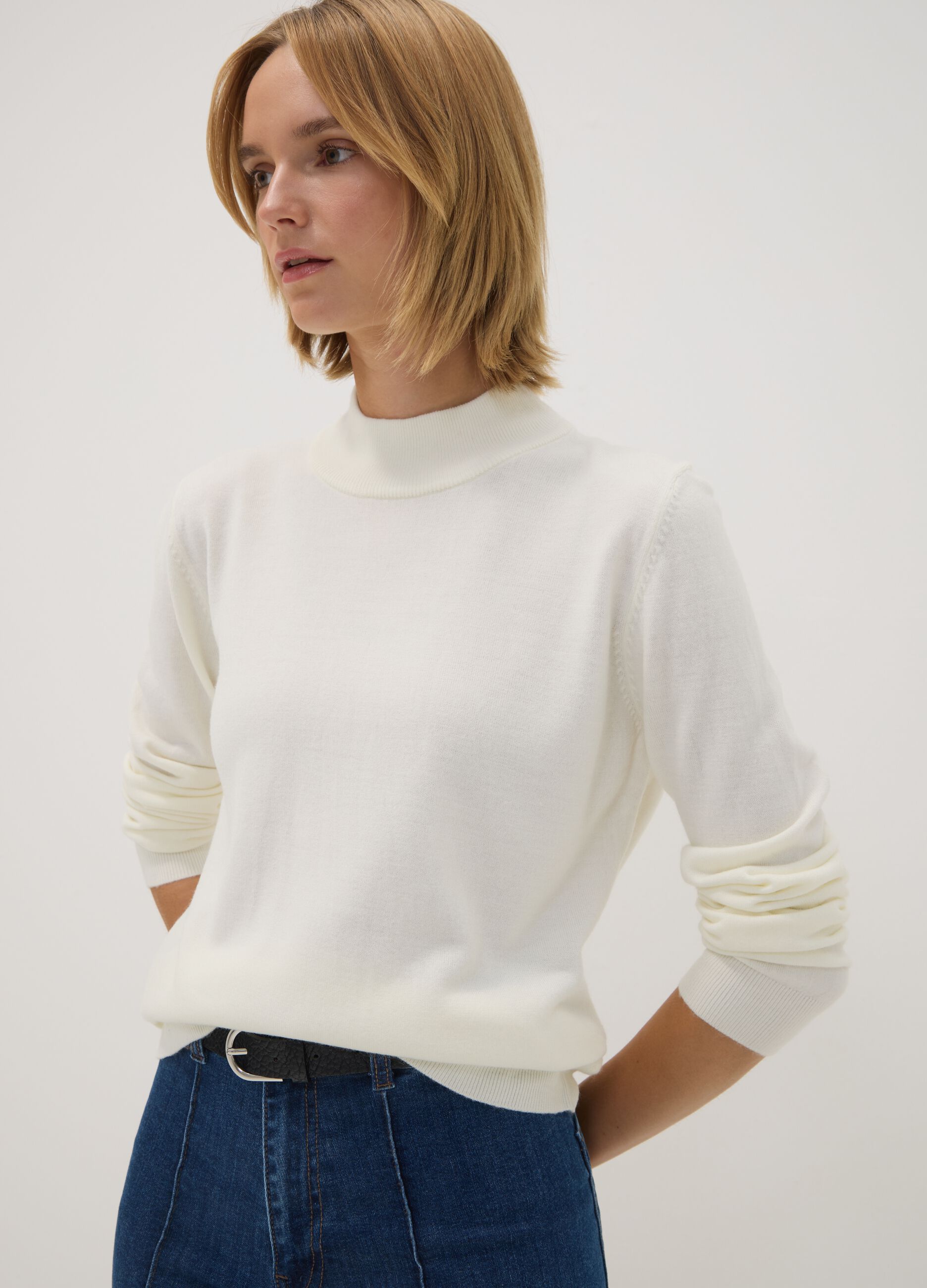 White long-sleeved top with high neck, regular fit