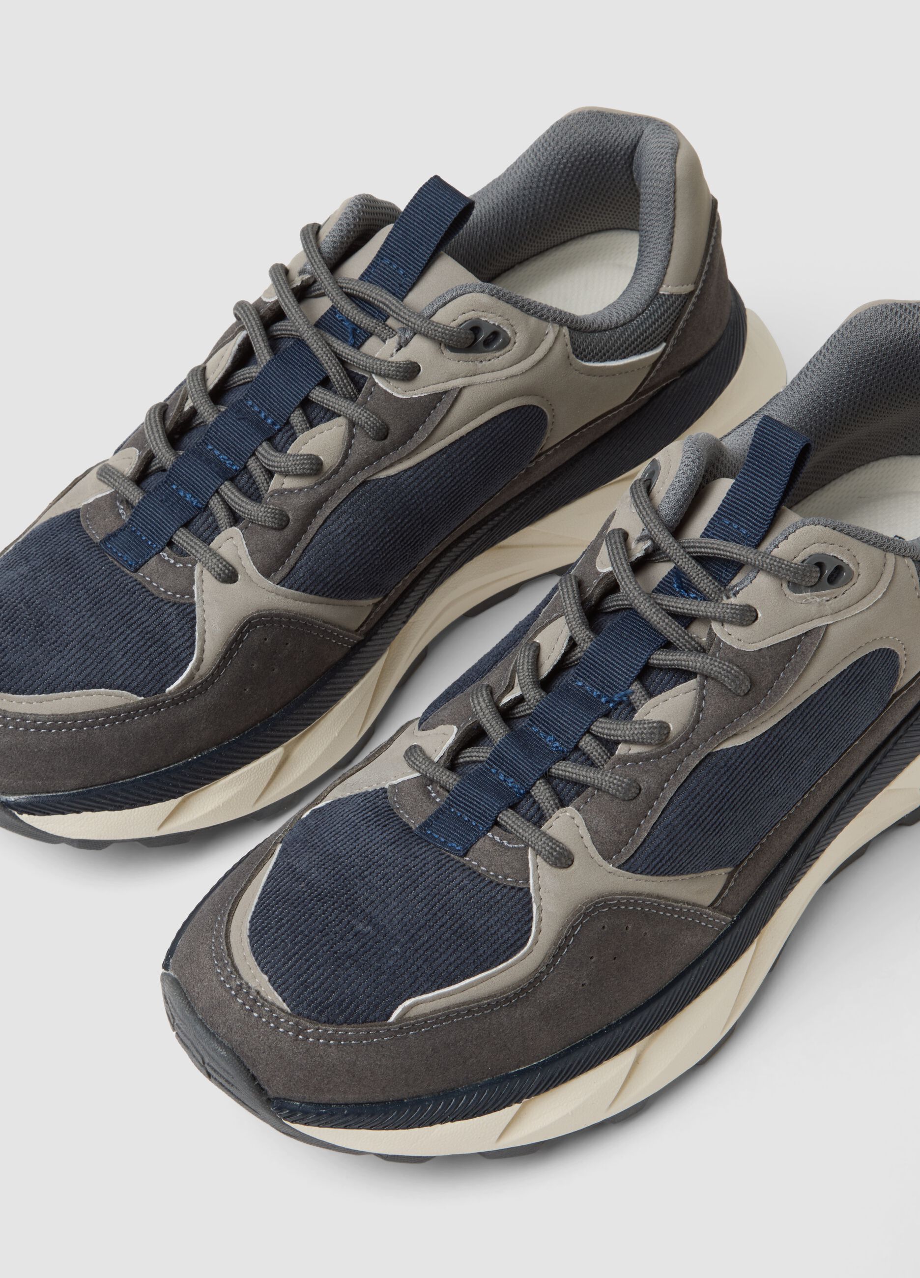 Blue casual trainers with laces and running-style sole
