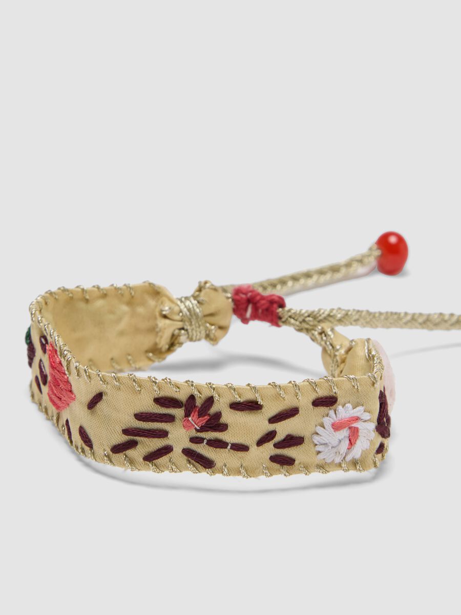 Beige embroidered bracelet with adjustable tie cords_2