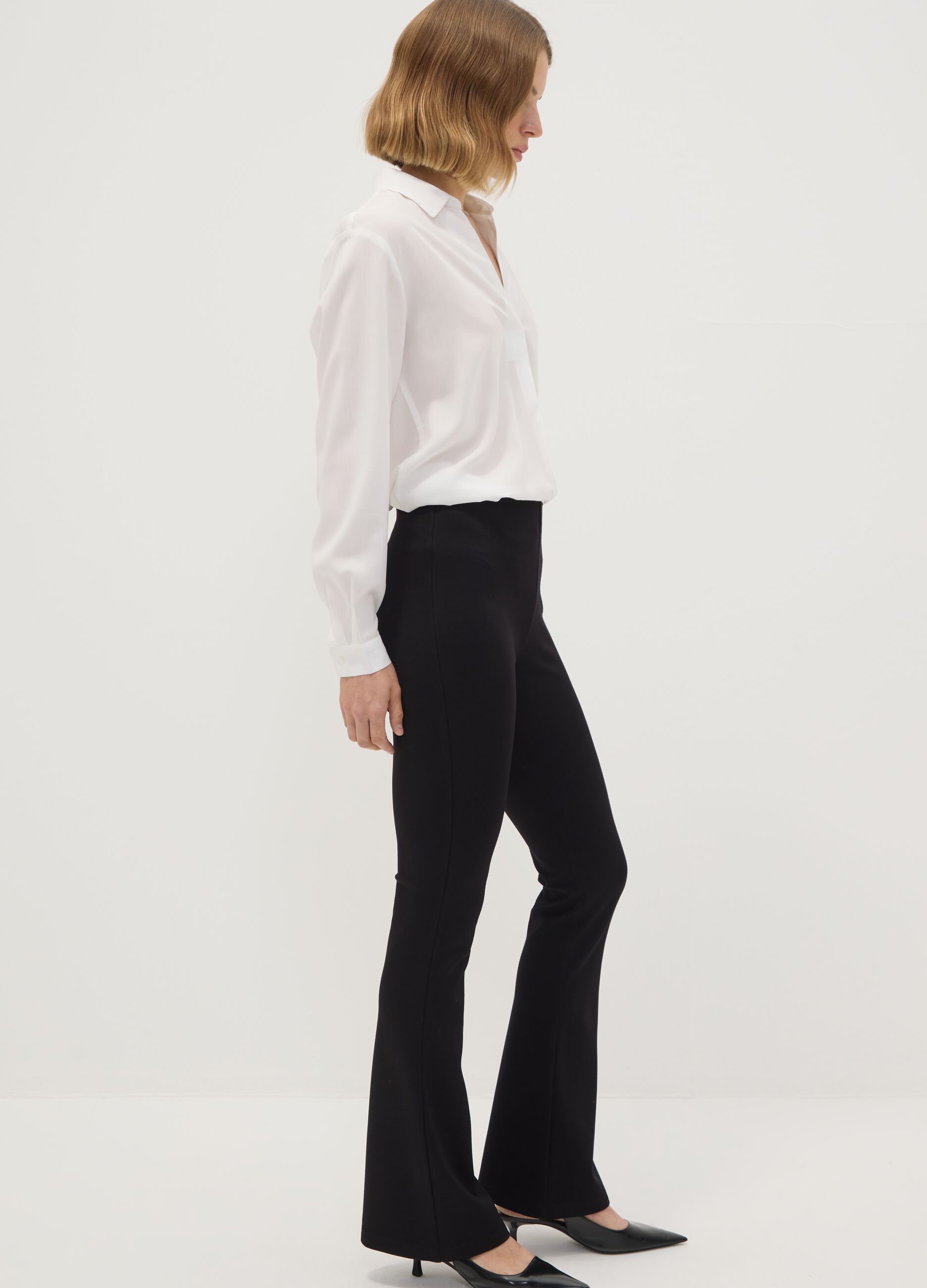 Black flared leggings in stretch viscose Milano stitch