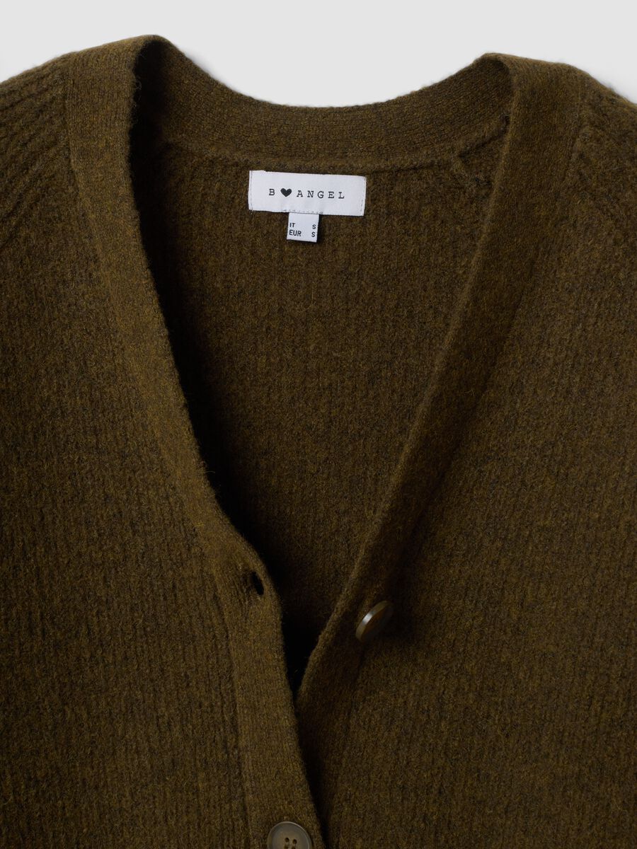 Green stretch wool cardigan with deep V-neck, oversized fit_1
