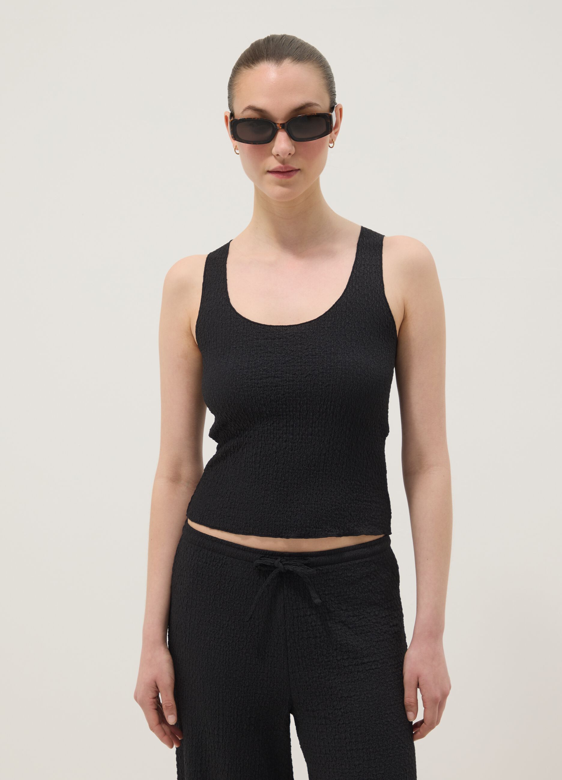 Black stretch tank top with crinkled texture