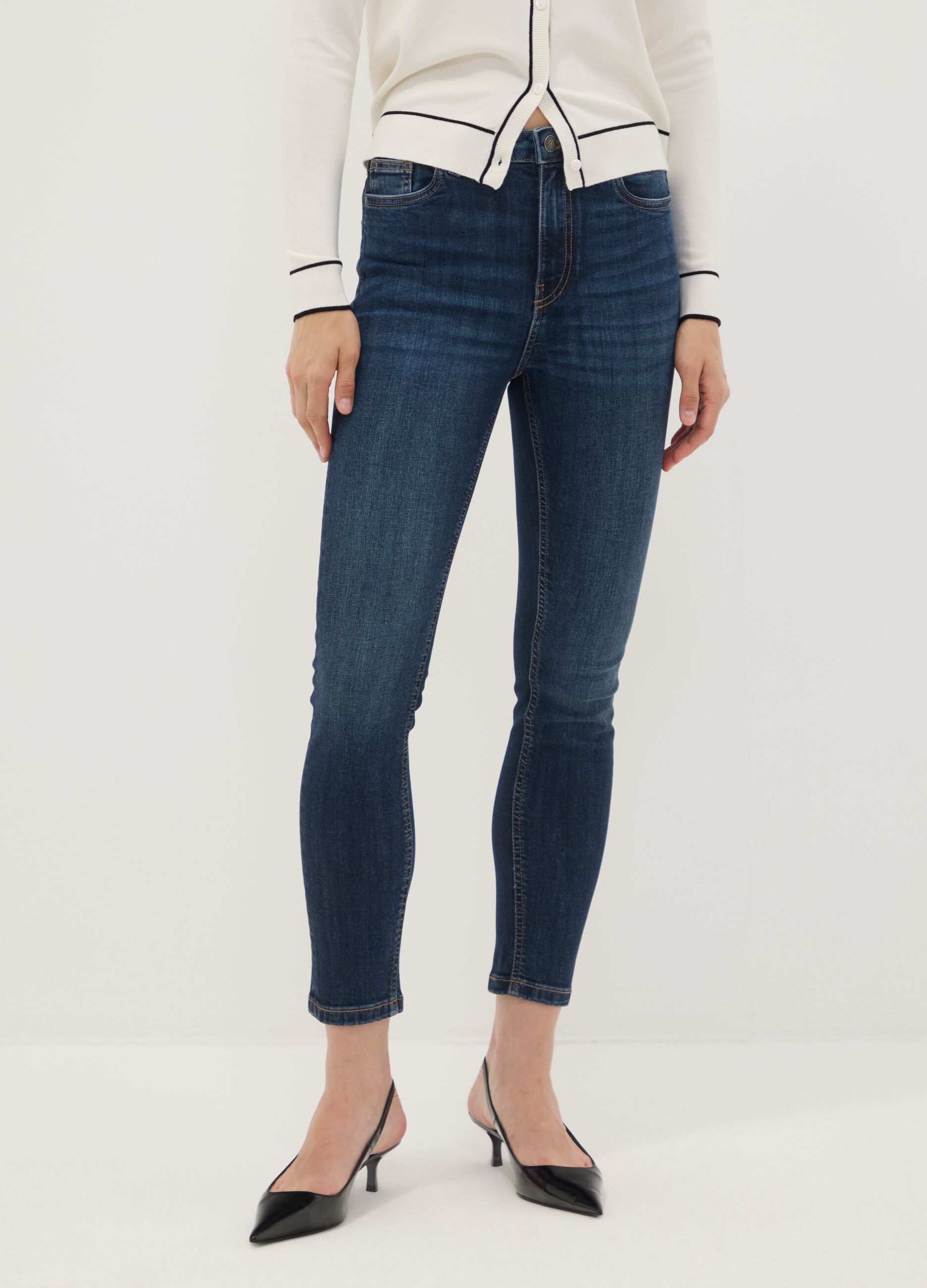 Mid-wash skinny-fit jeans in stretch cotton
