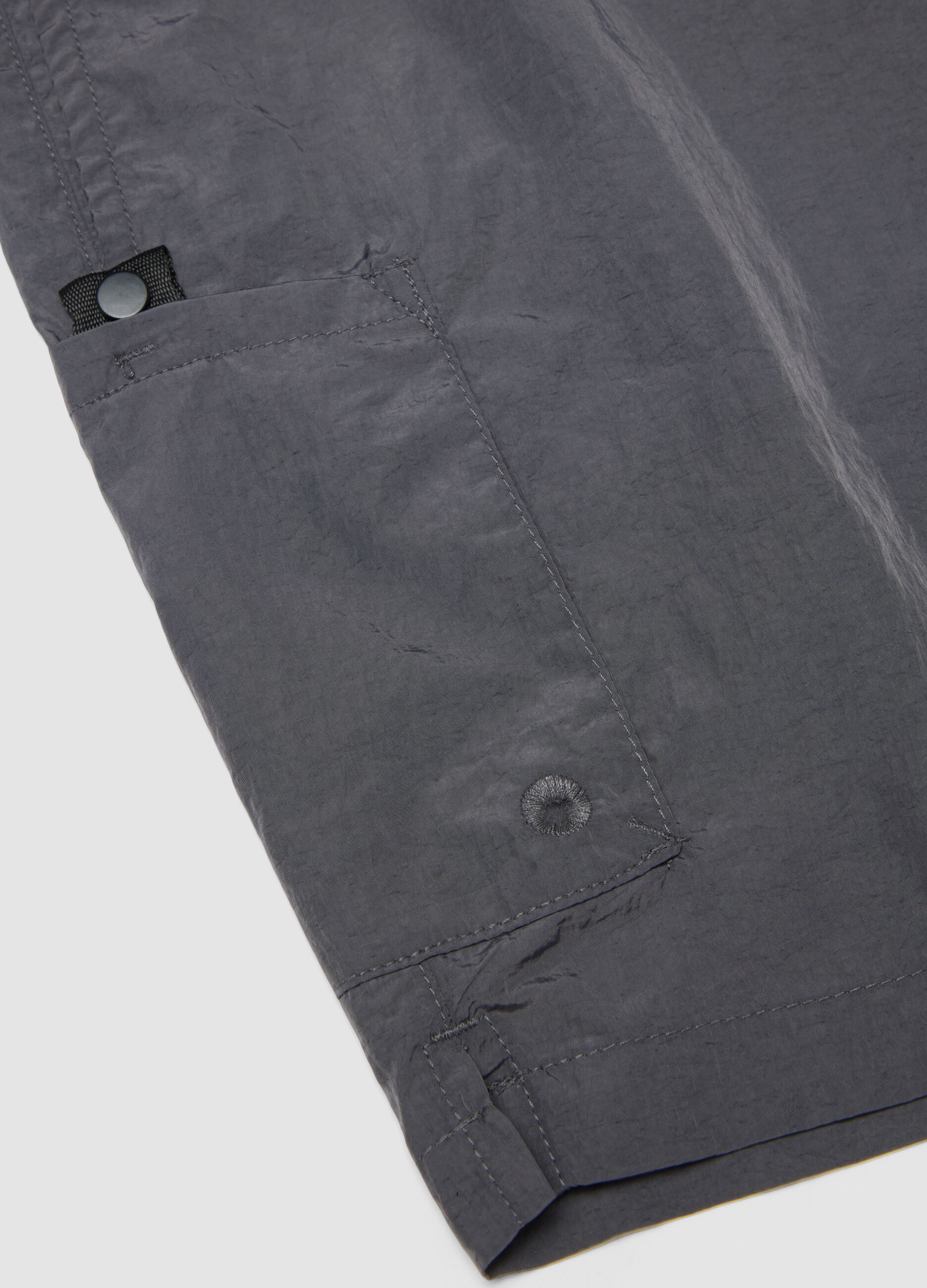 Grey swim shorts with elasticated waistband