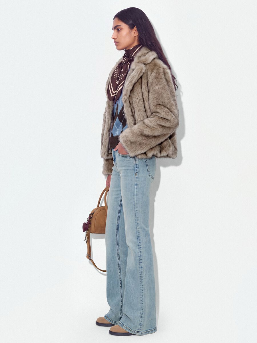 Jeans blu chiaro flare in cotone elasticizzato_1