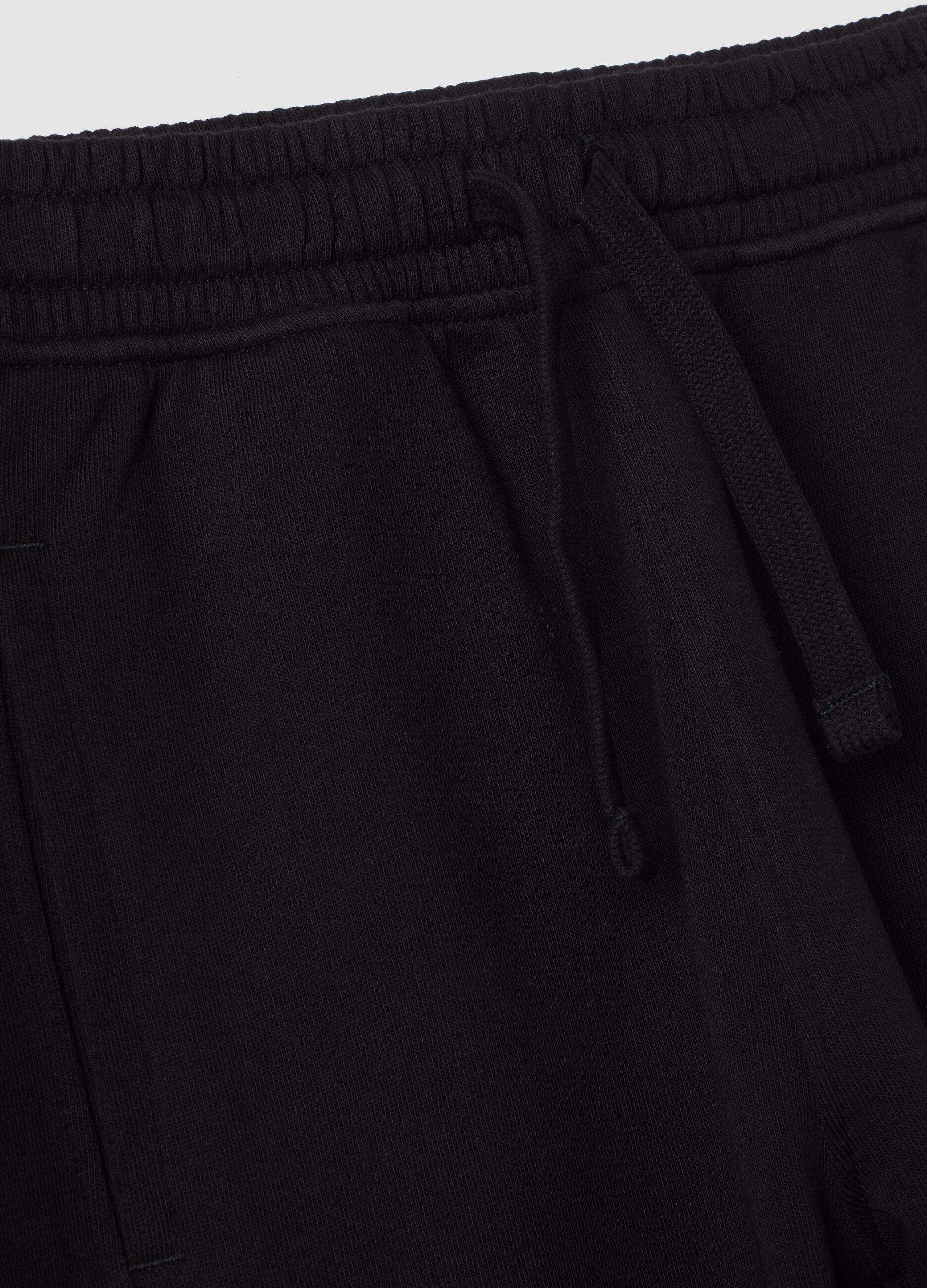 Pantaloni jogger neri in puro cotone con fondo elastico