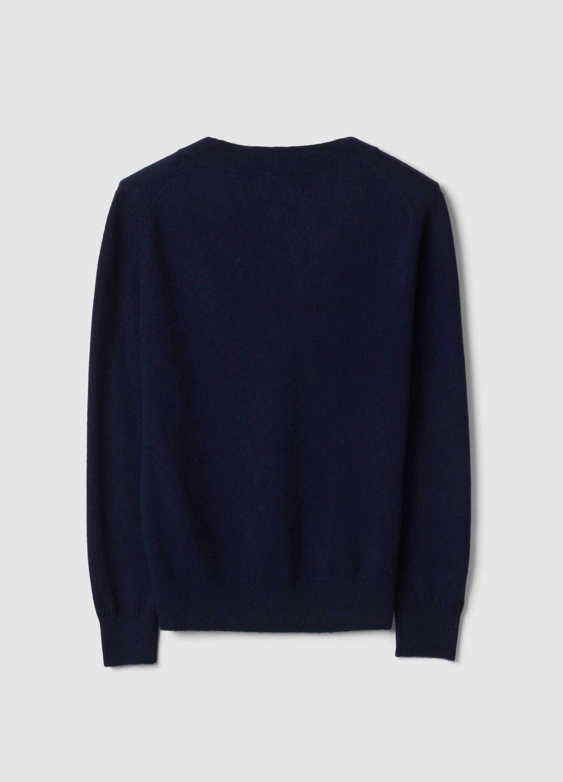 Maglia blu in pura lana con scollo profondo a V