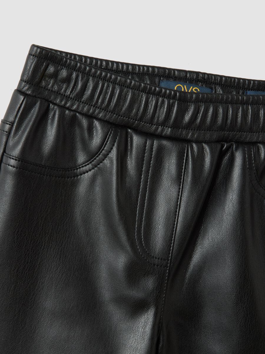 Black flared trousers with elasticated waist_1