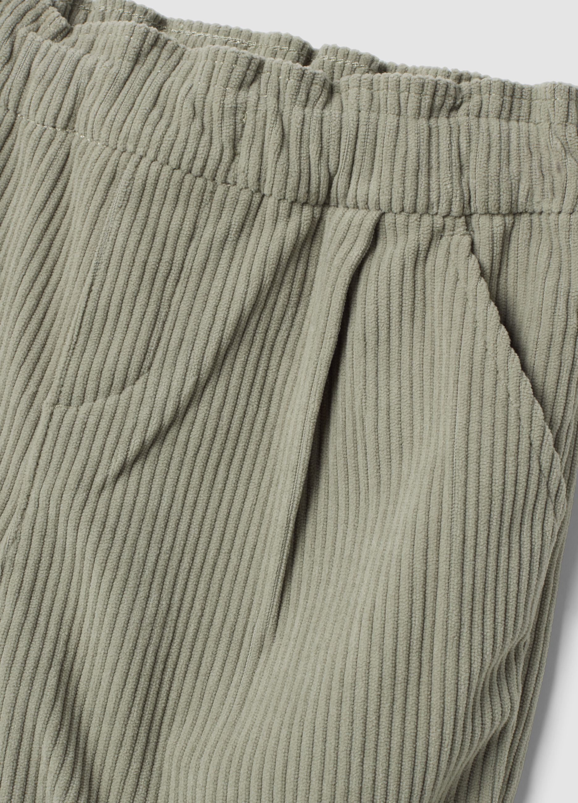 Grey ribbed trousers with elasticated waistband