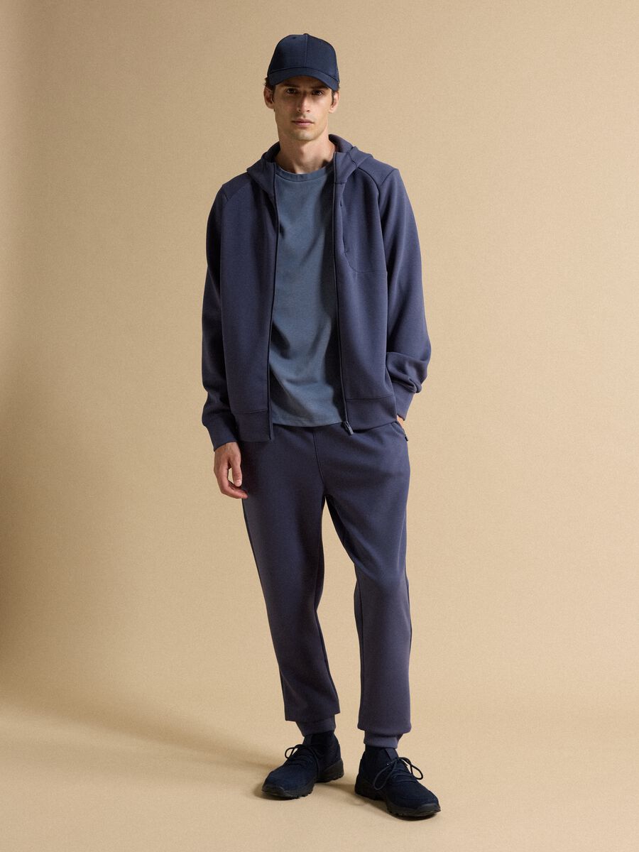 Blue cap with curved peak_1