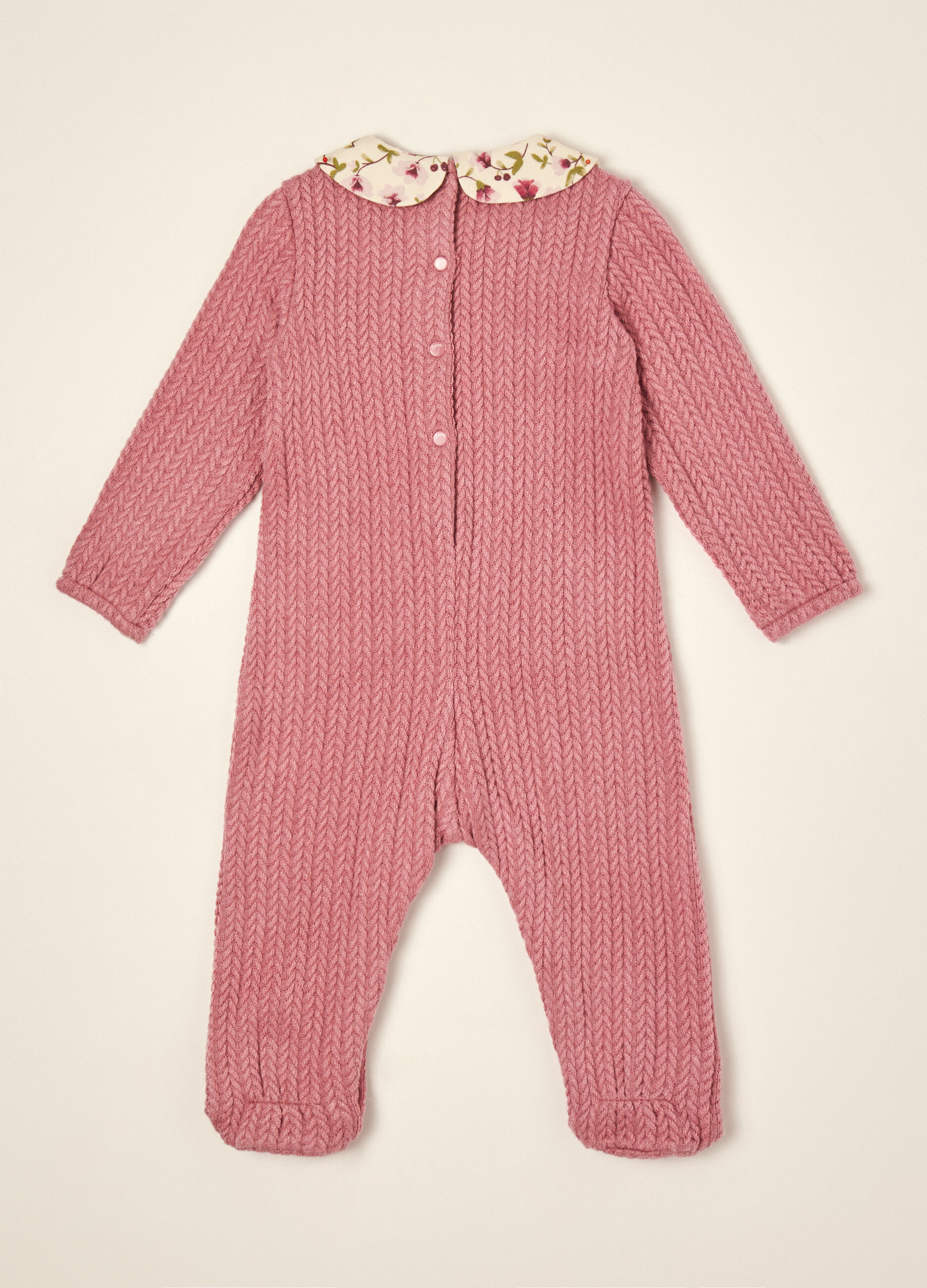 Pink stretch viscose baby sleepsuit with floral collar