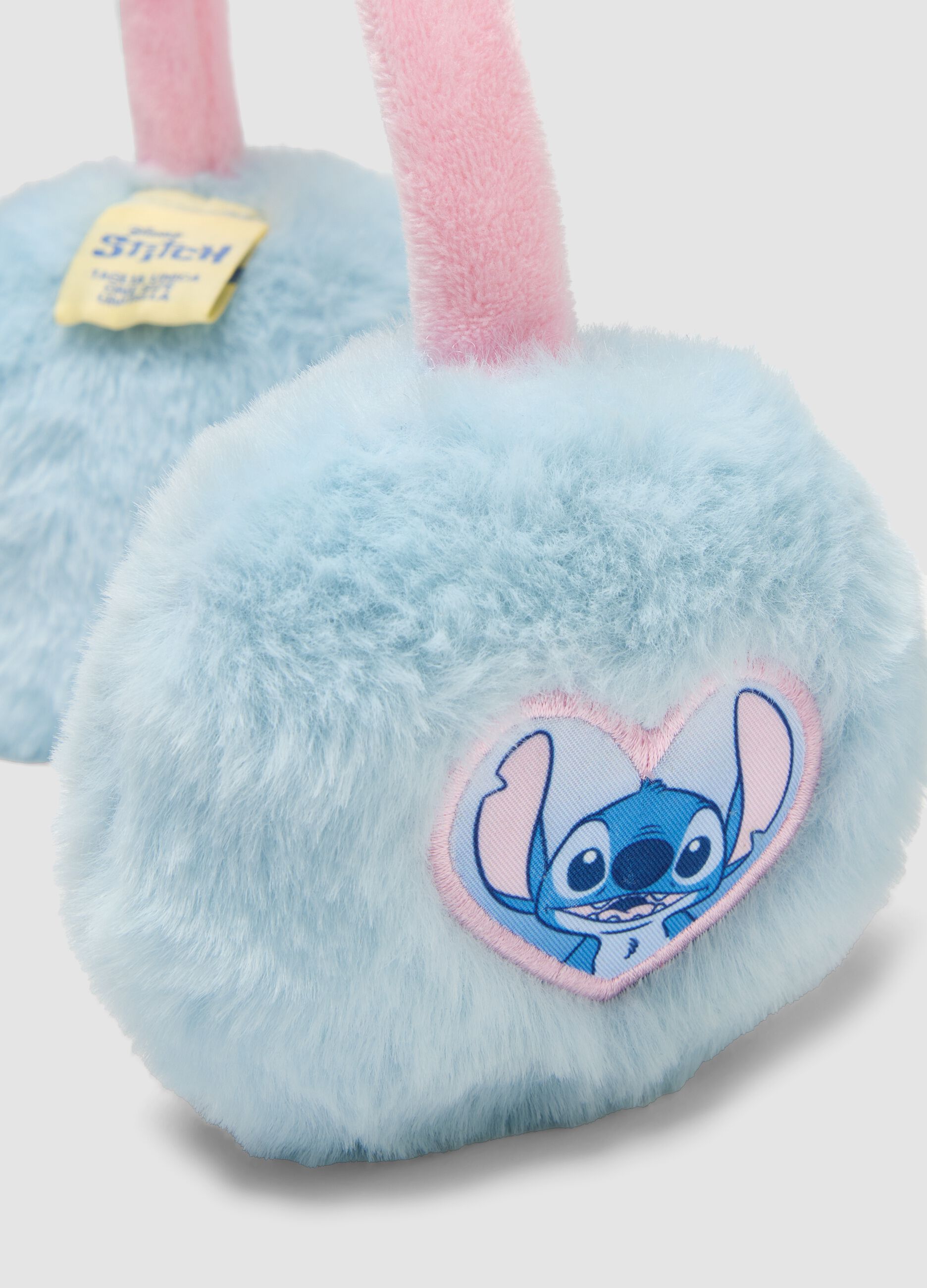 Blue ear warmers with Stitch patch