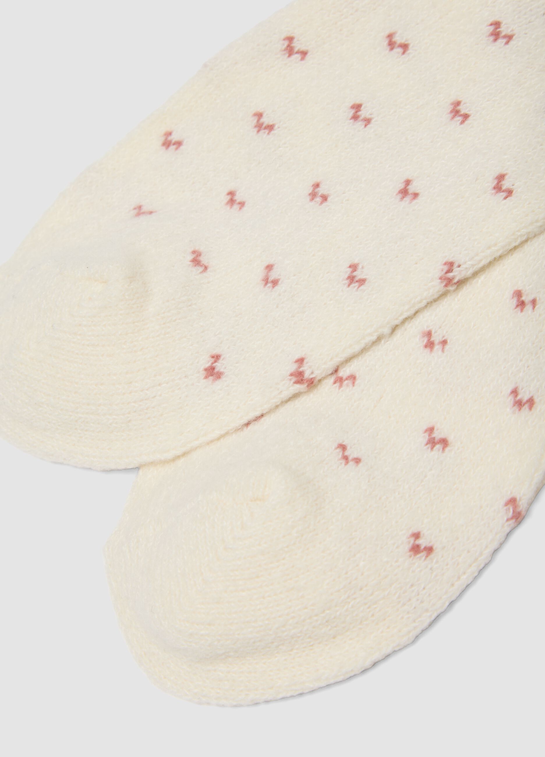 Calzini bianchi in tessuto elasticizzato con fantasia jacquard