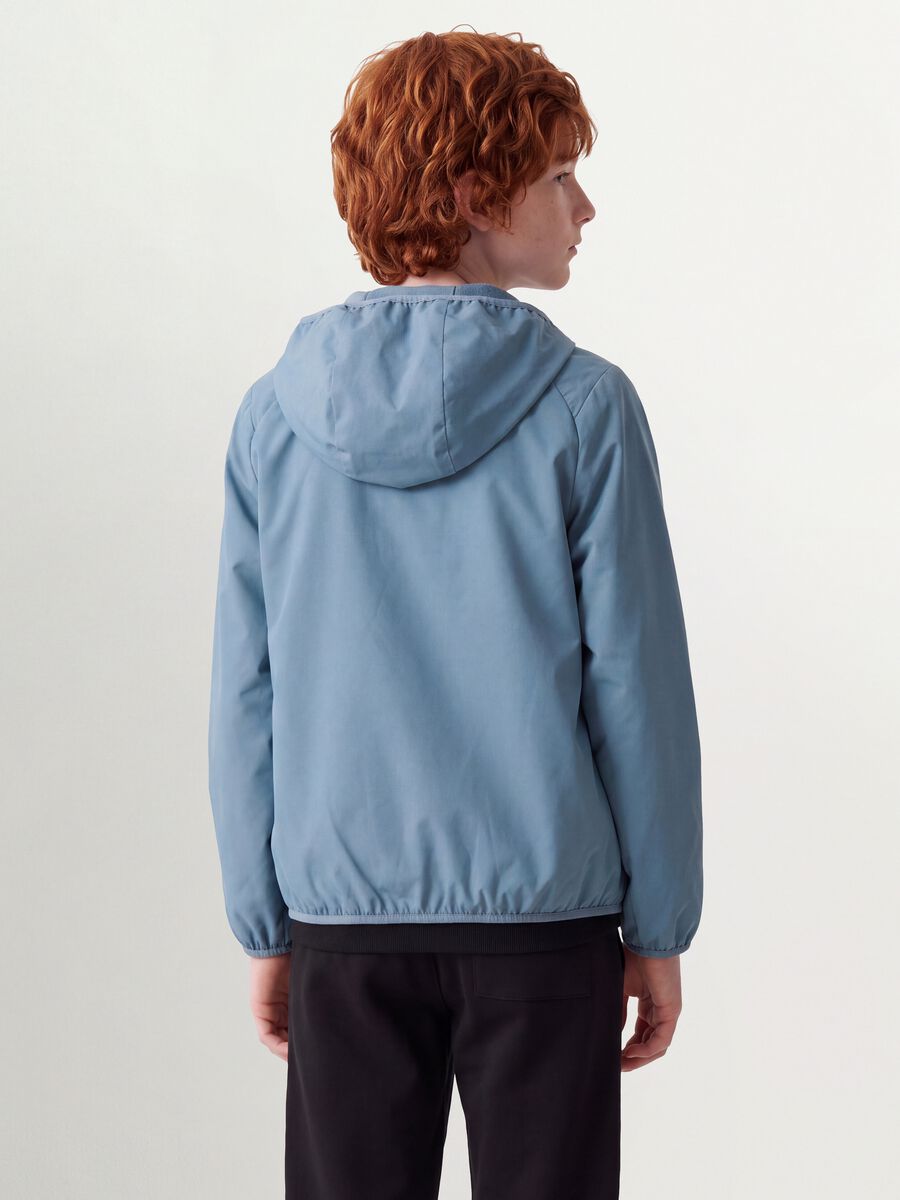 Blue oversized rain jacket with hood and zip for boys_3