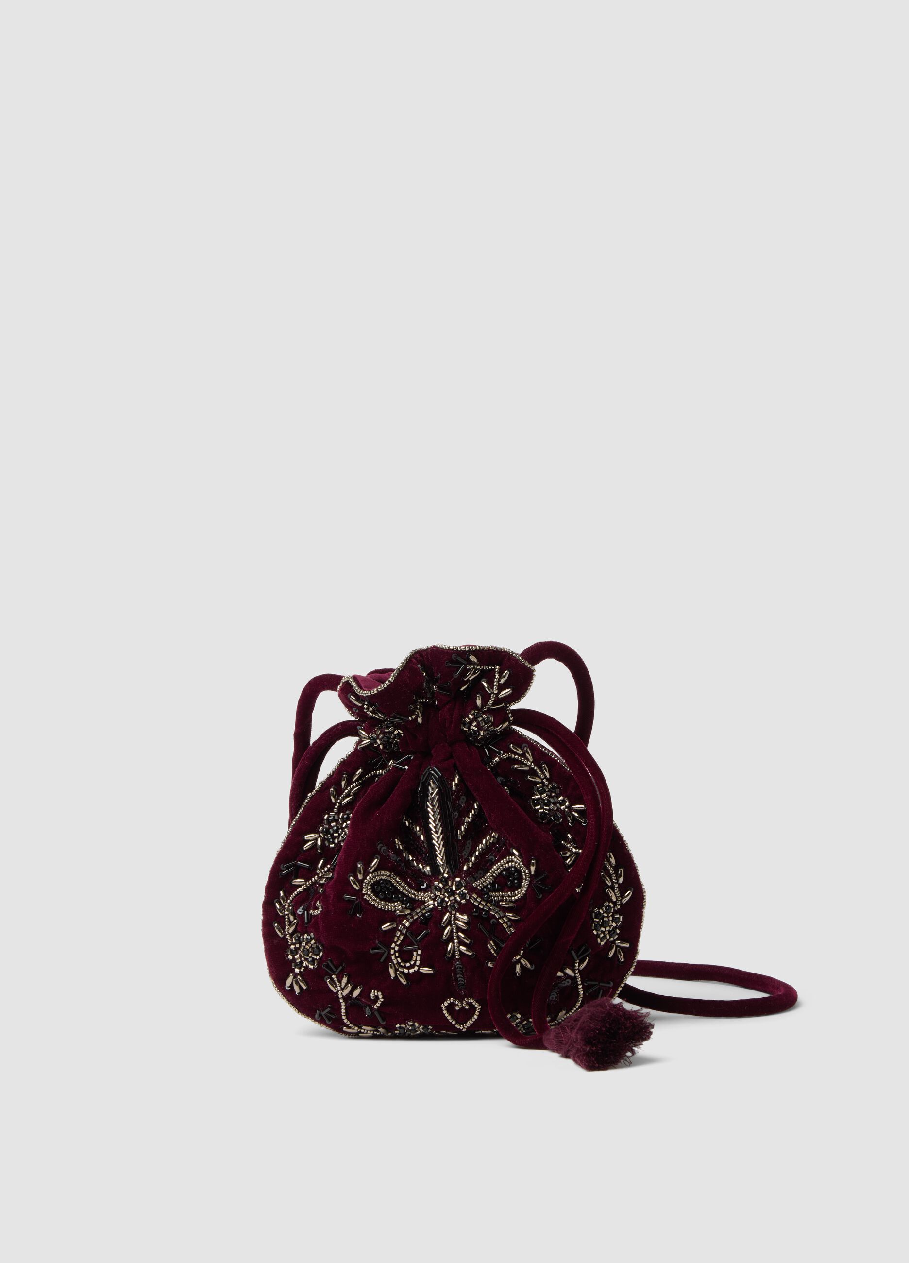 Red bucket bag with beaded embroidery