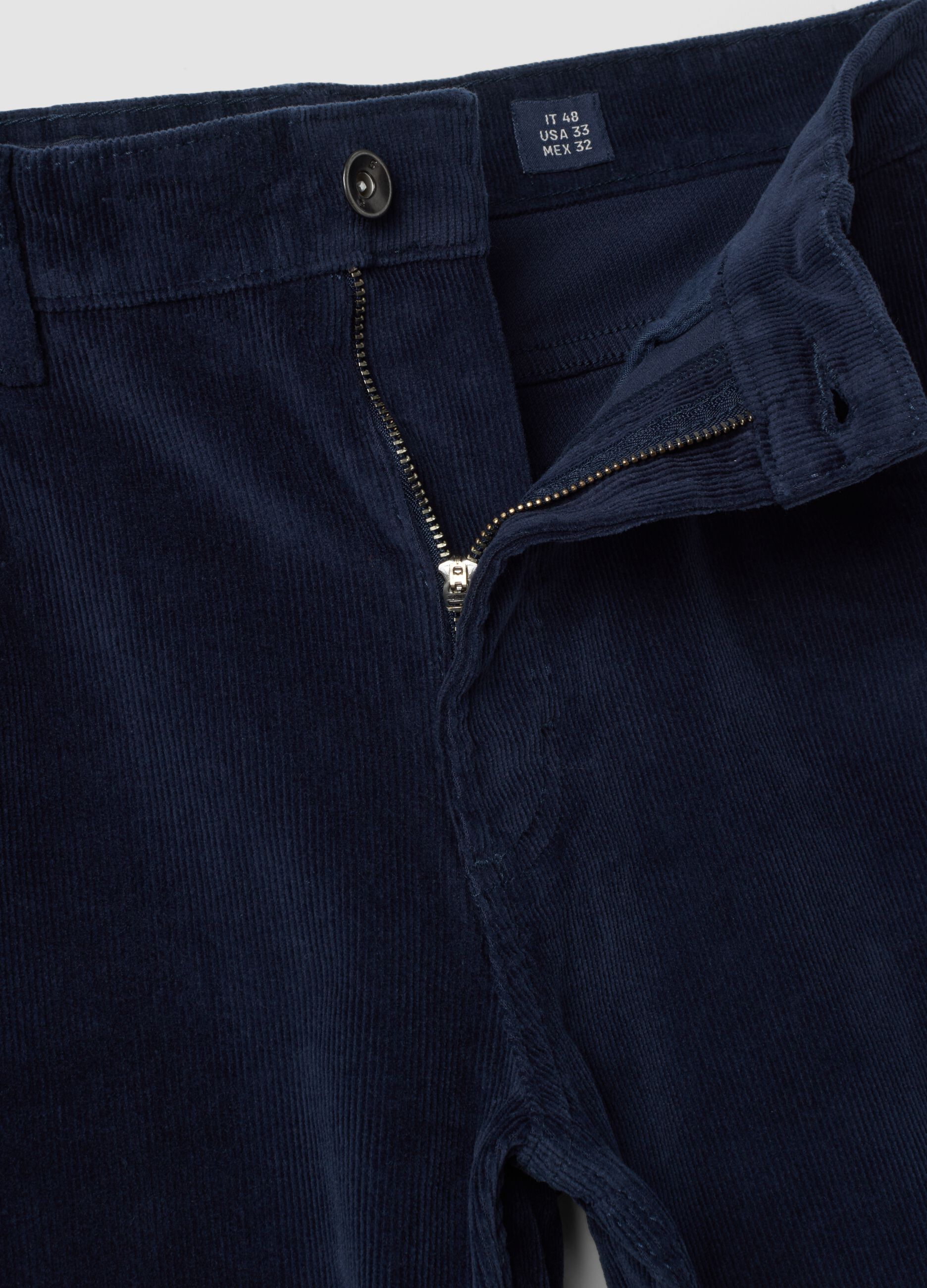 Pantaloni blu in cotone elasticizzato a coste regular fit
