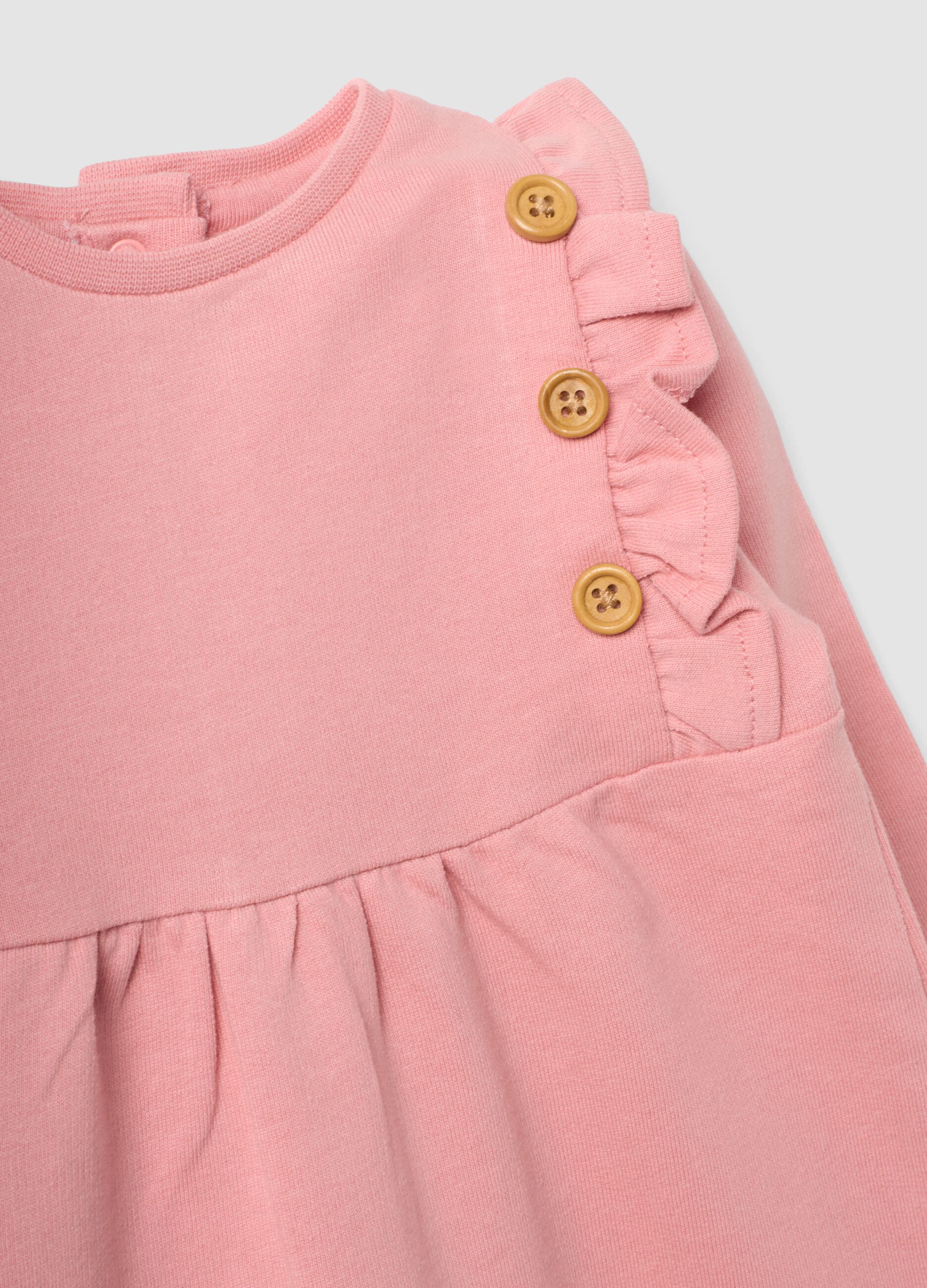 Pink organic cotton romper with ruffle for baby girl