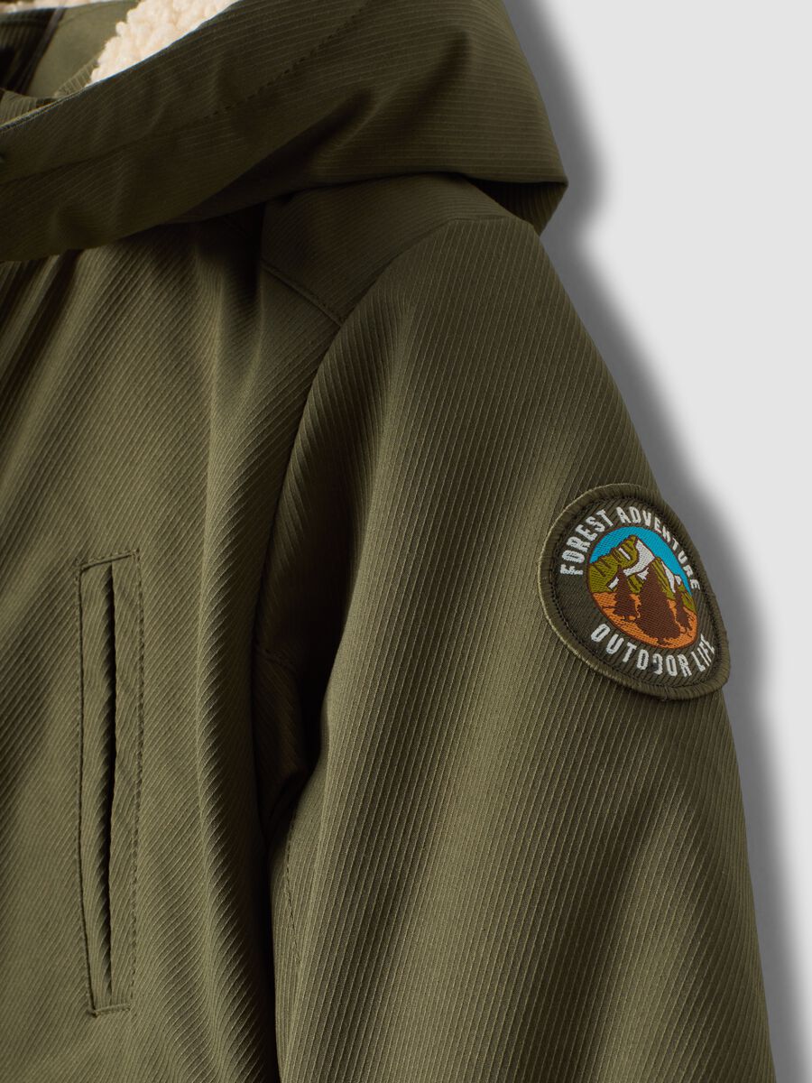 Long padded green parka with hood_3