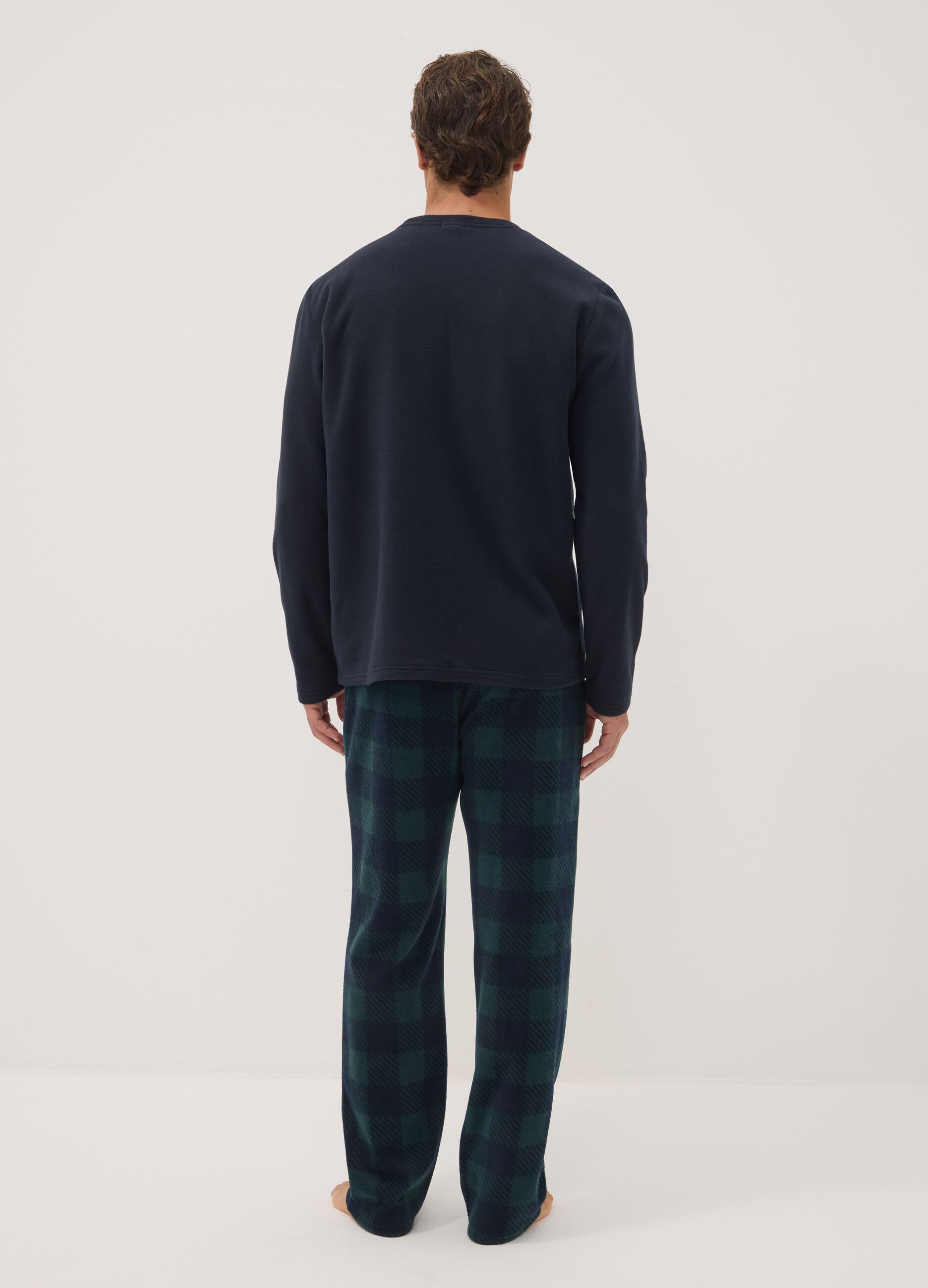 Navy blue long pyjamas with crew neck top and check trousers
