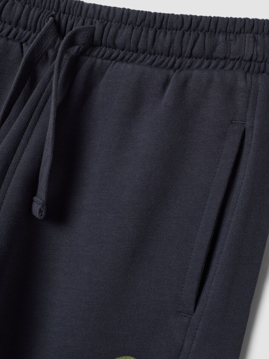 Grey jogger trousers in pure organic cotton with print_3