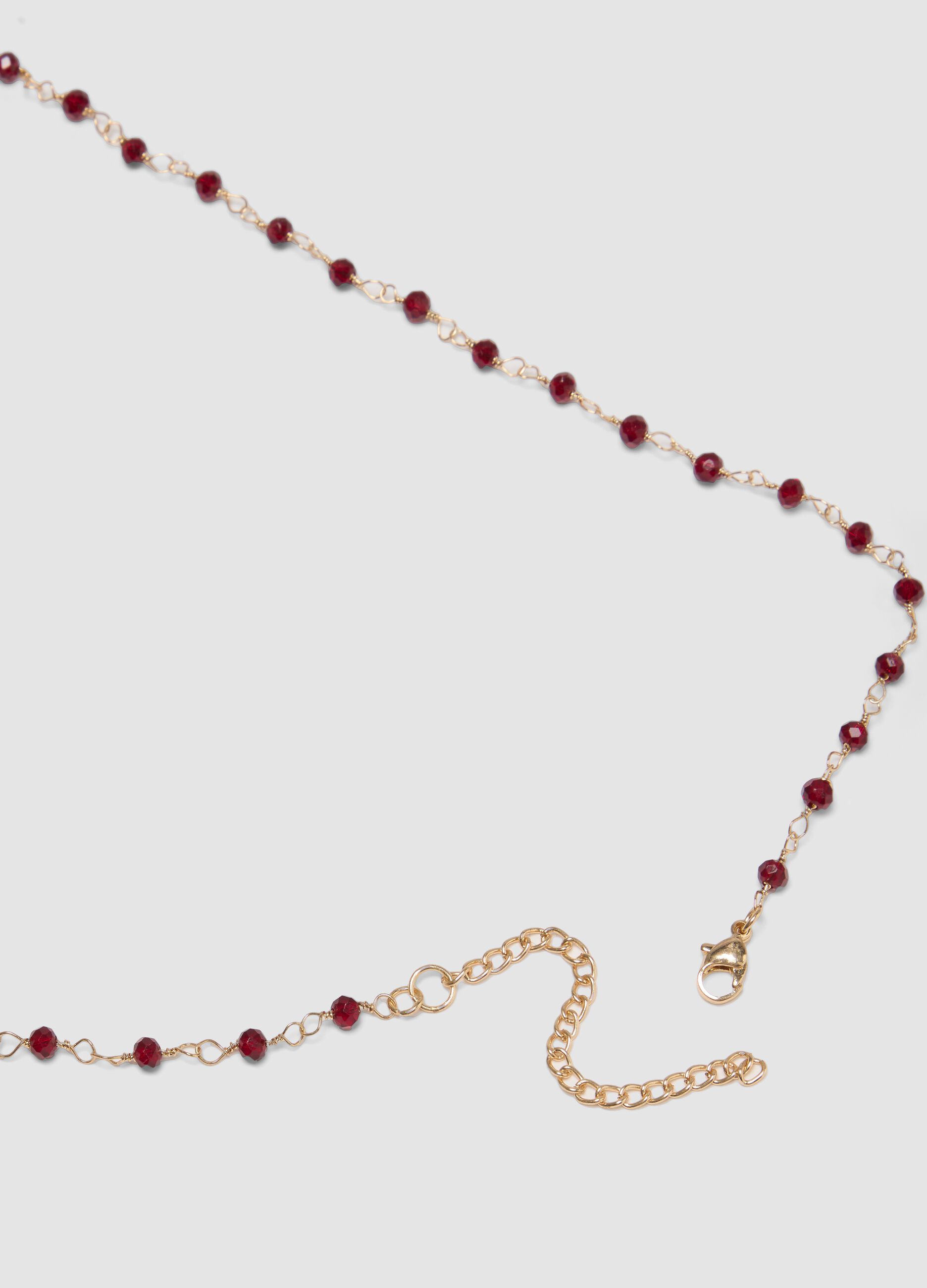 Pink necklace with embroidered heart pendant