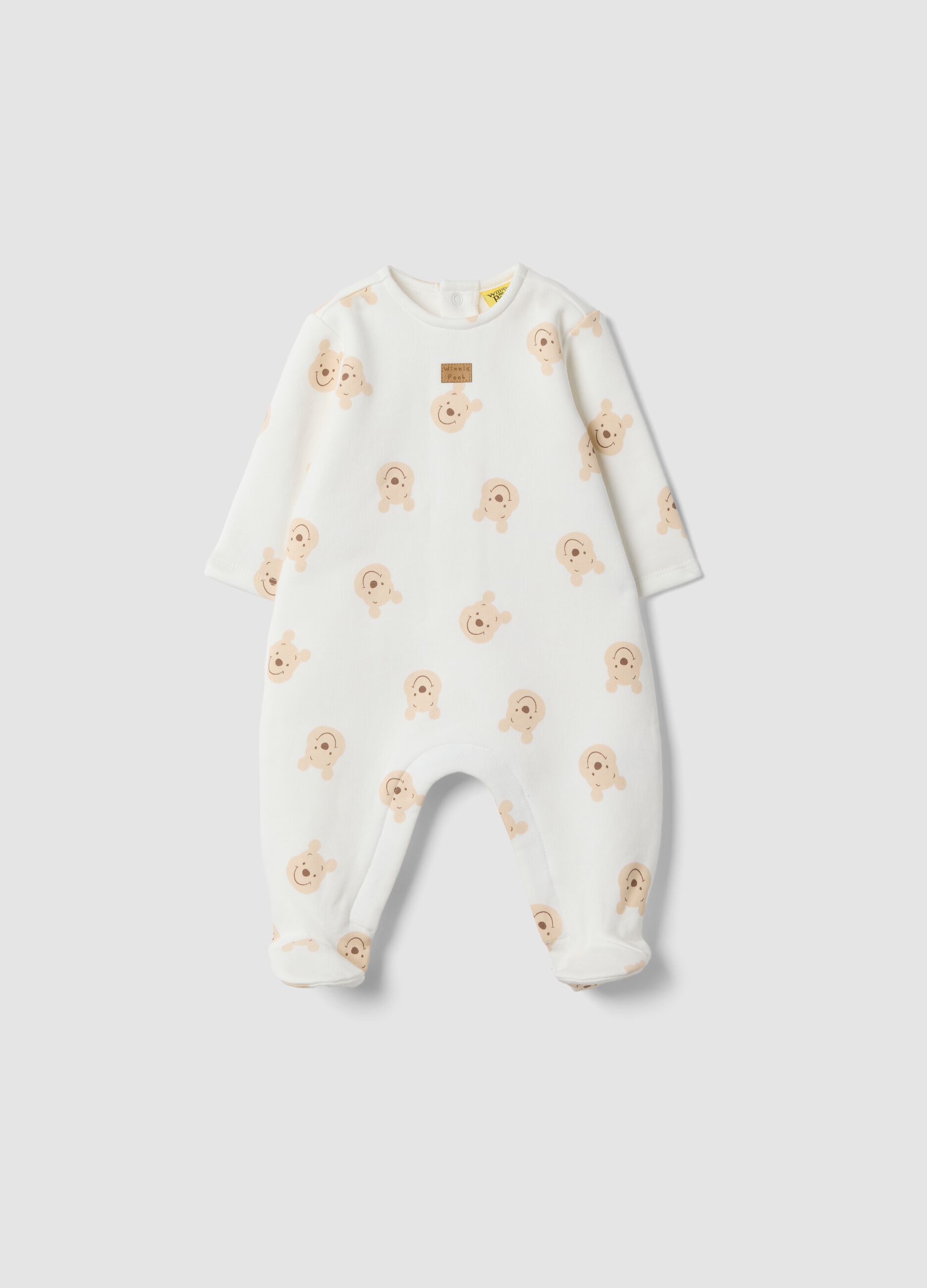 White organic cotton sleepsuit with Winnie the Pooh print