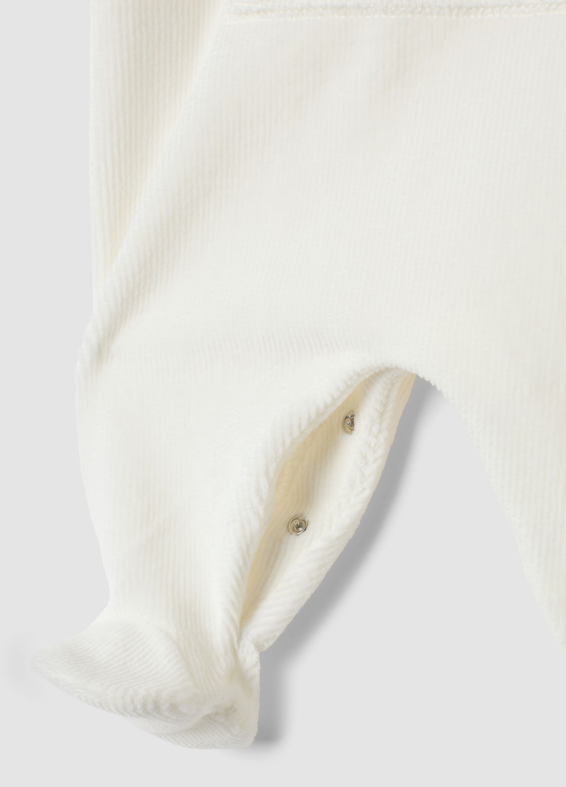 Tutina bianca in cotone organico elasticizzato con piedini e stampa Minnie