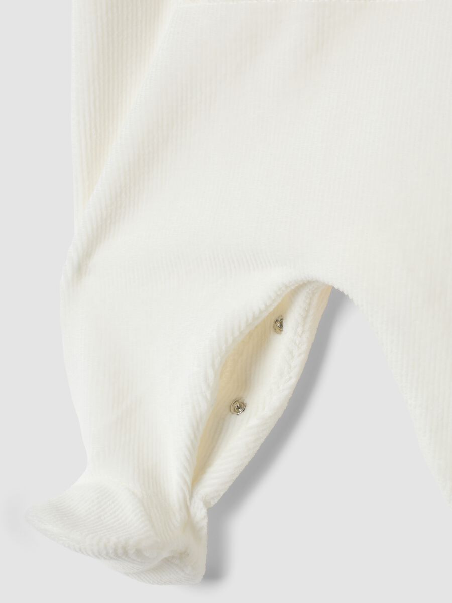 Tutina bianca in cotone organico elasticizzato con piedini e stampa Minnie_2