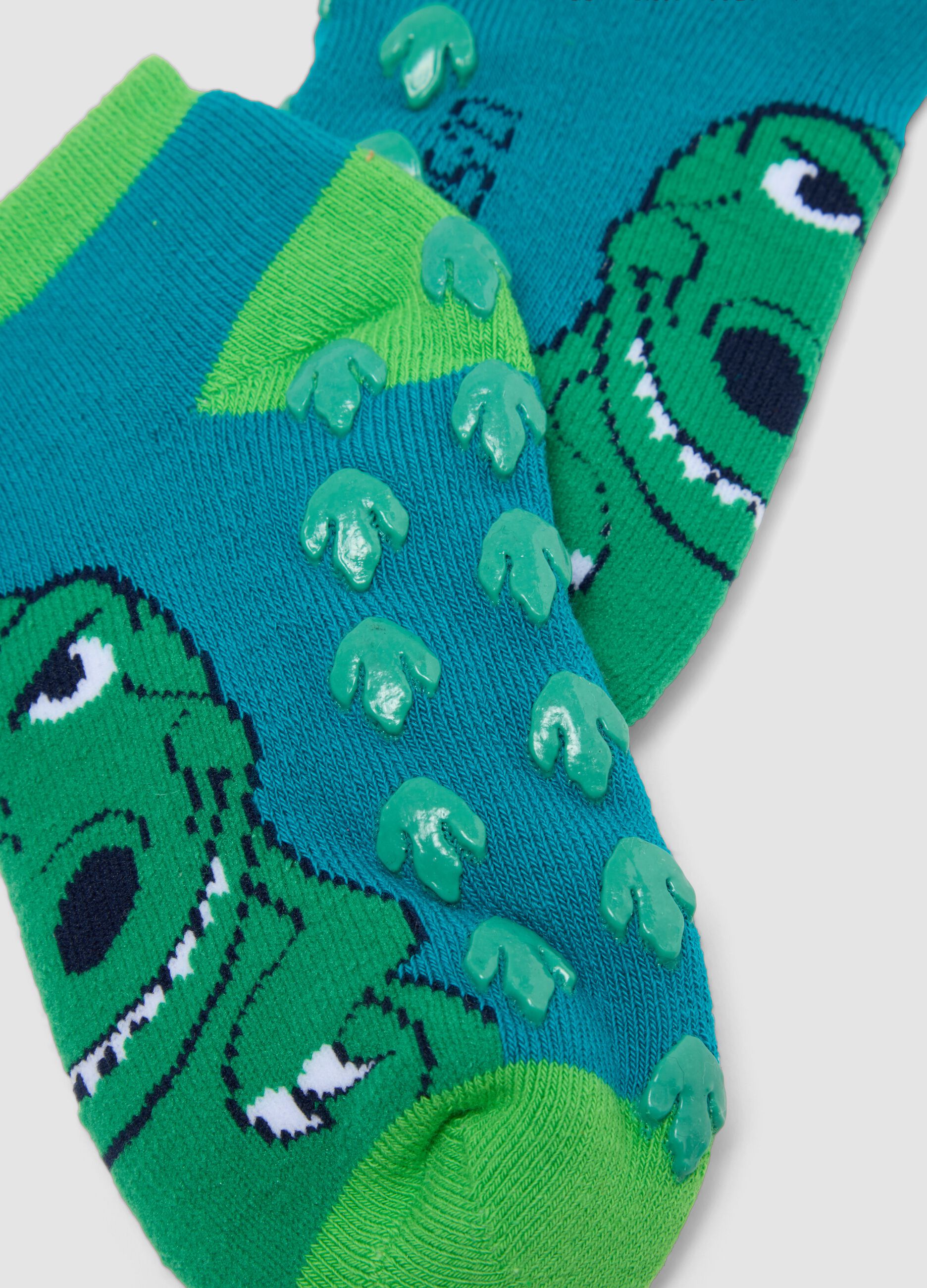 2-pack of green anti-slip socks in stretchy organic cotton with dinosaur print