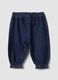 Blue denim joggers in cotton-viscose blend with floral embroidery, comfort fit_1