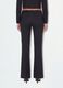 Pantaloni neri flare in viscosa elasticizzata con fantasia gessata_2