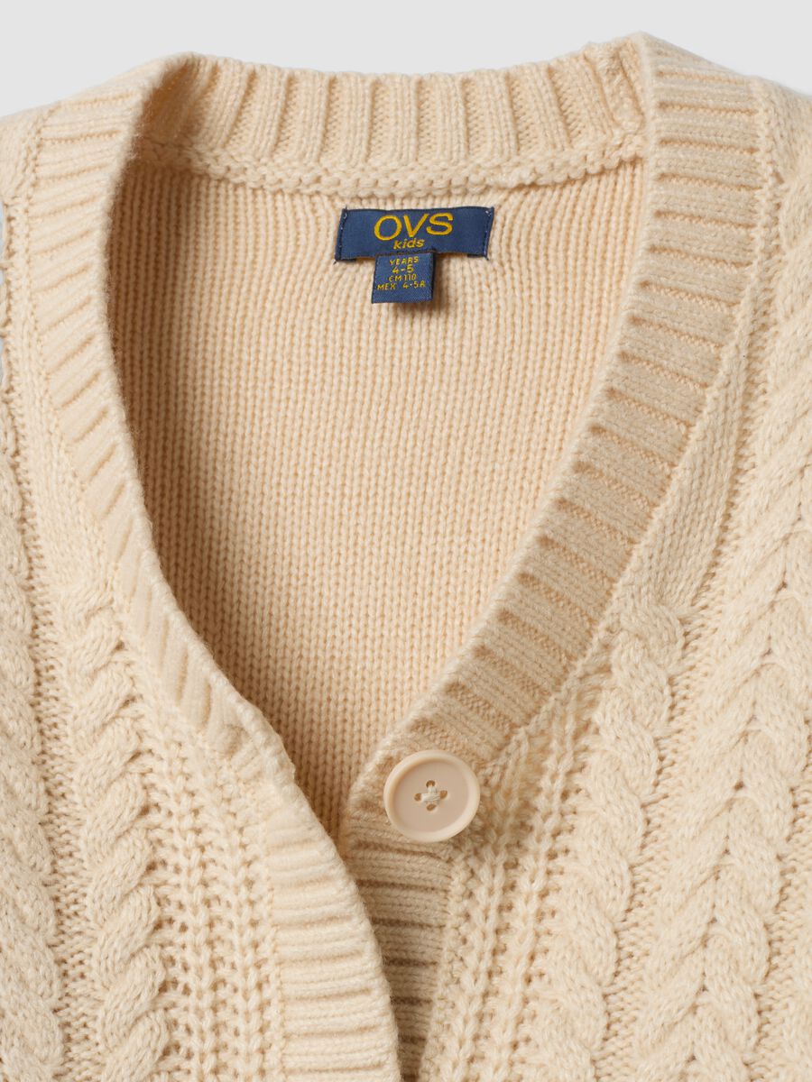 Cardigan beige in maglia con scollo profondo a V_2