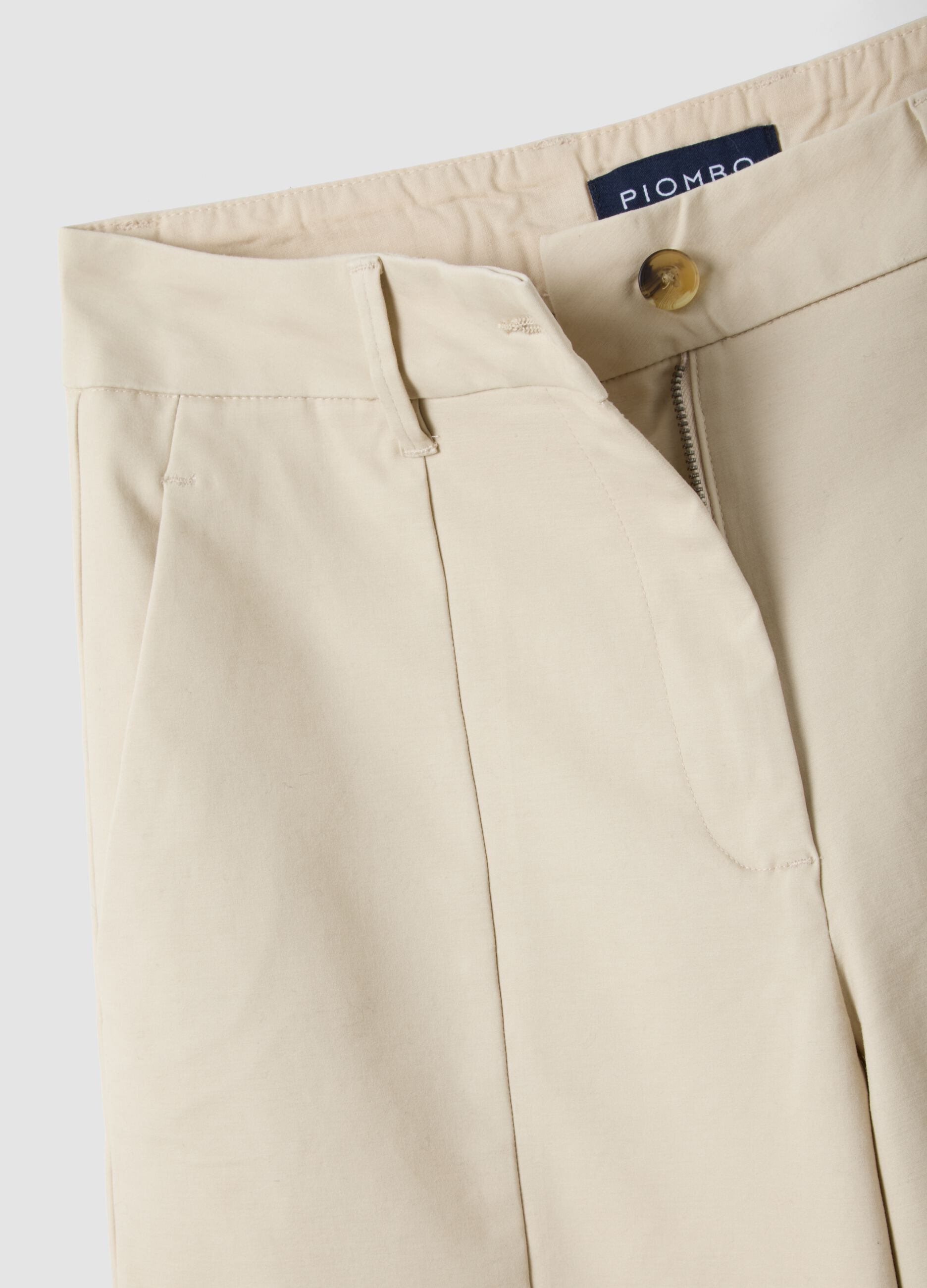Pantaloni beige flare in cotone elasticizzato