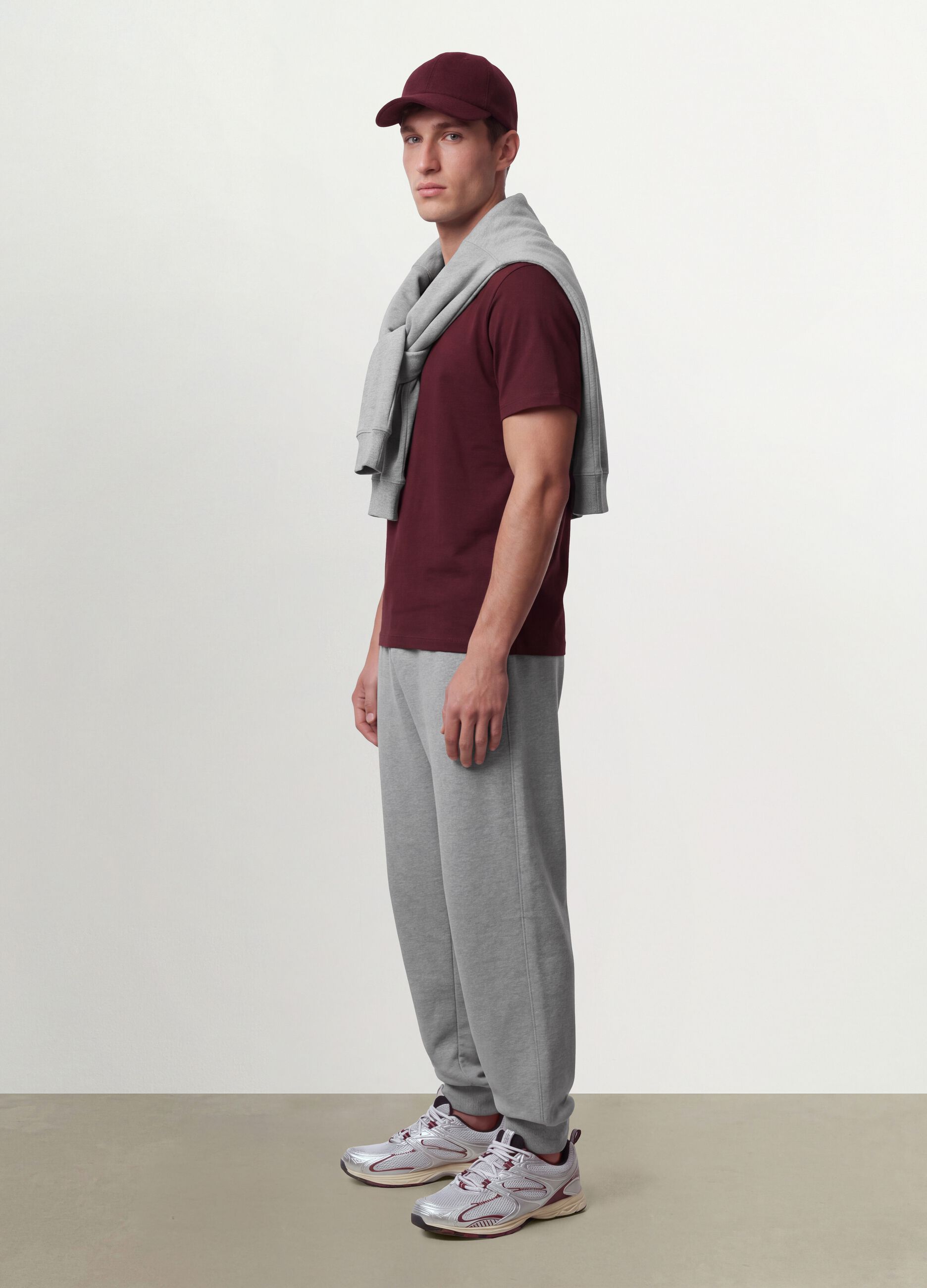Grey cotton-blend joggers with cuffed hems and drawstring