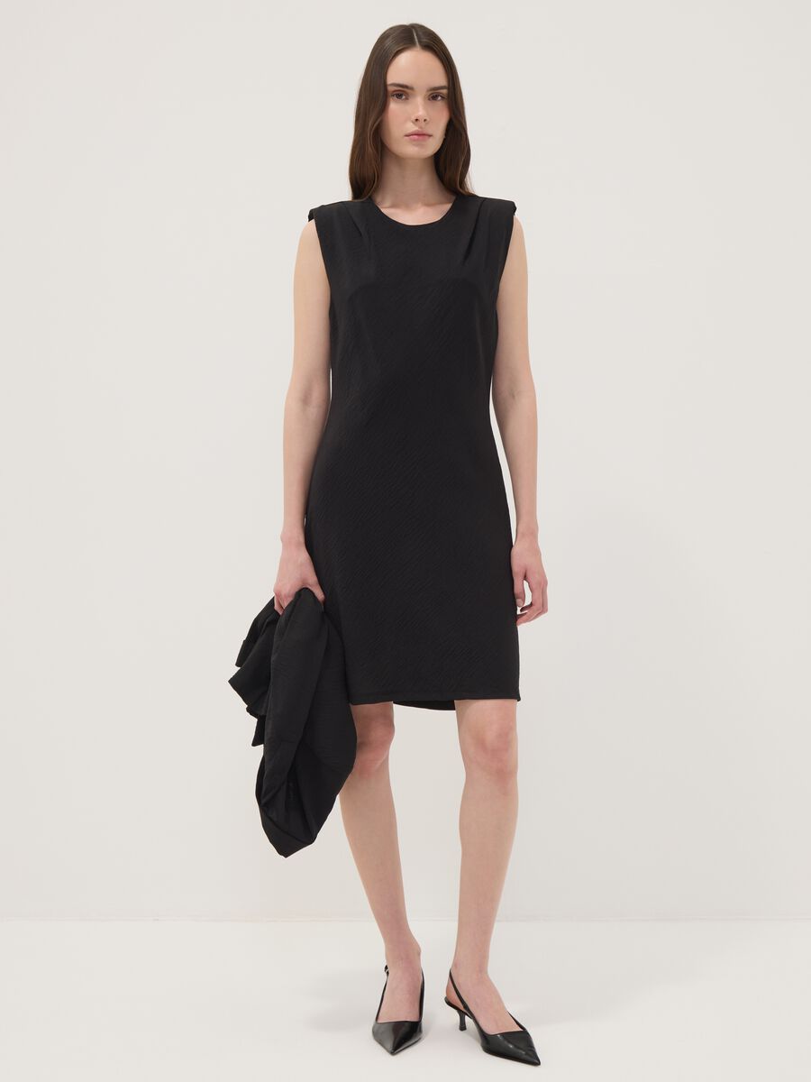 Black fitted dress with ruched detailing_0