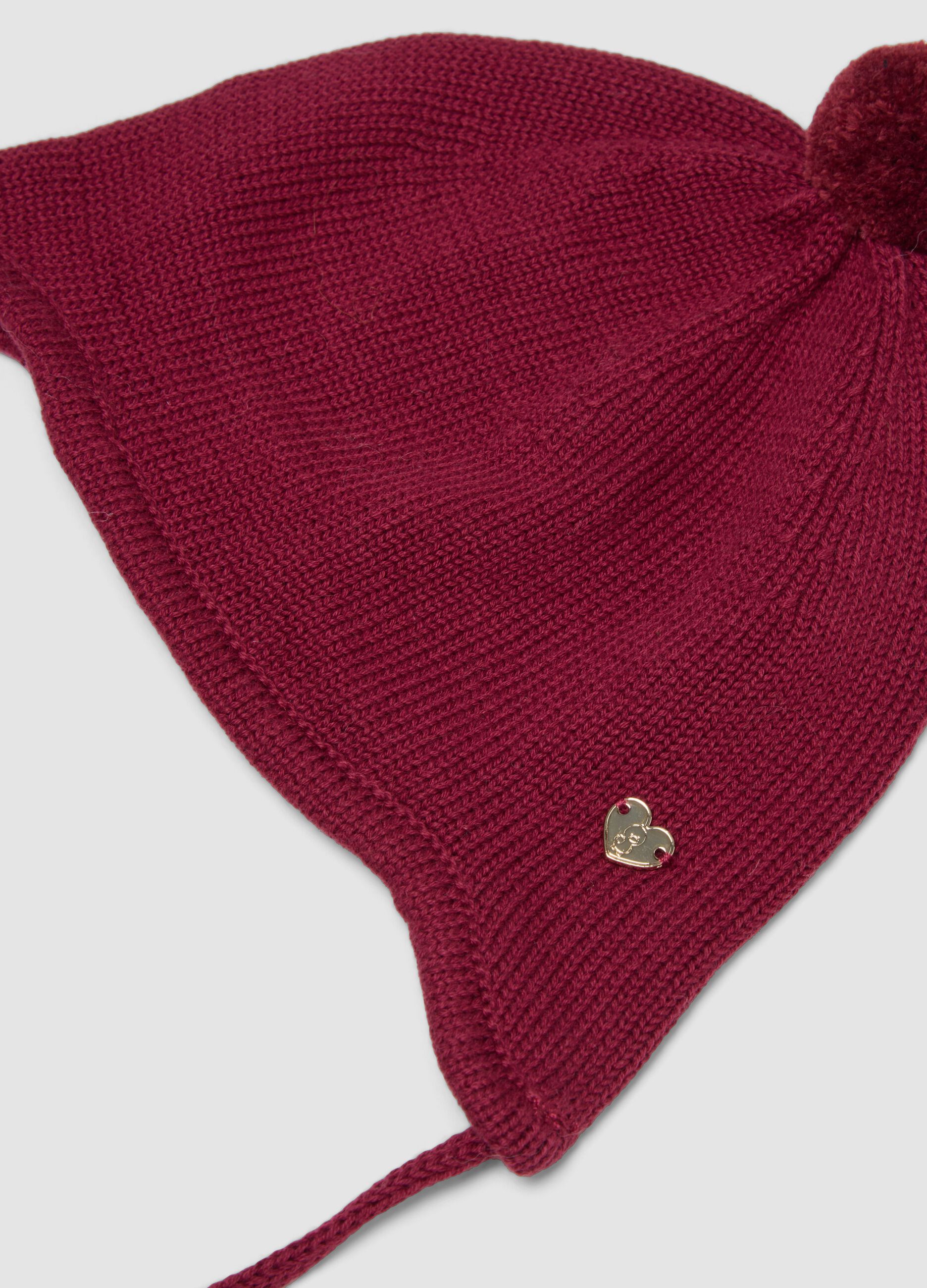 Cappello rosso in puro cotone organico con pon pon