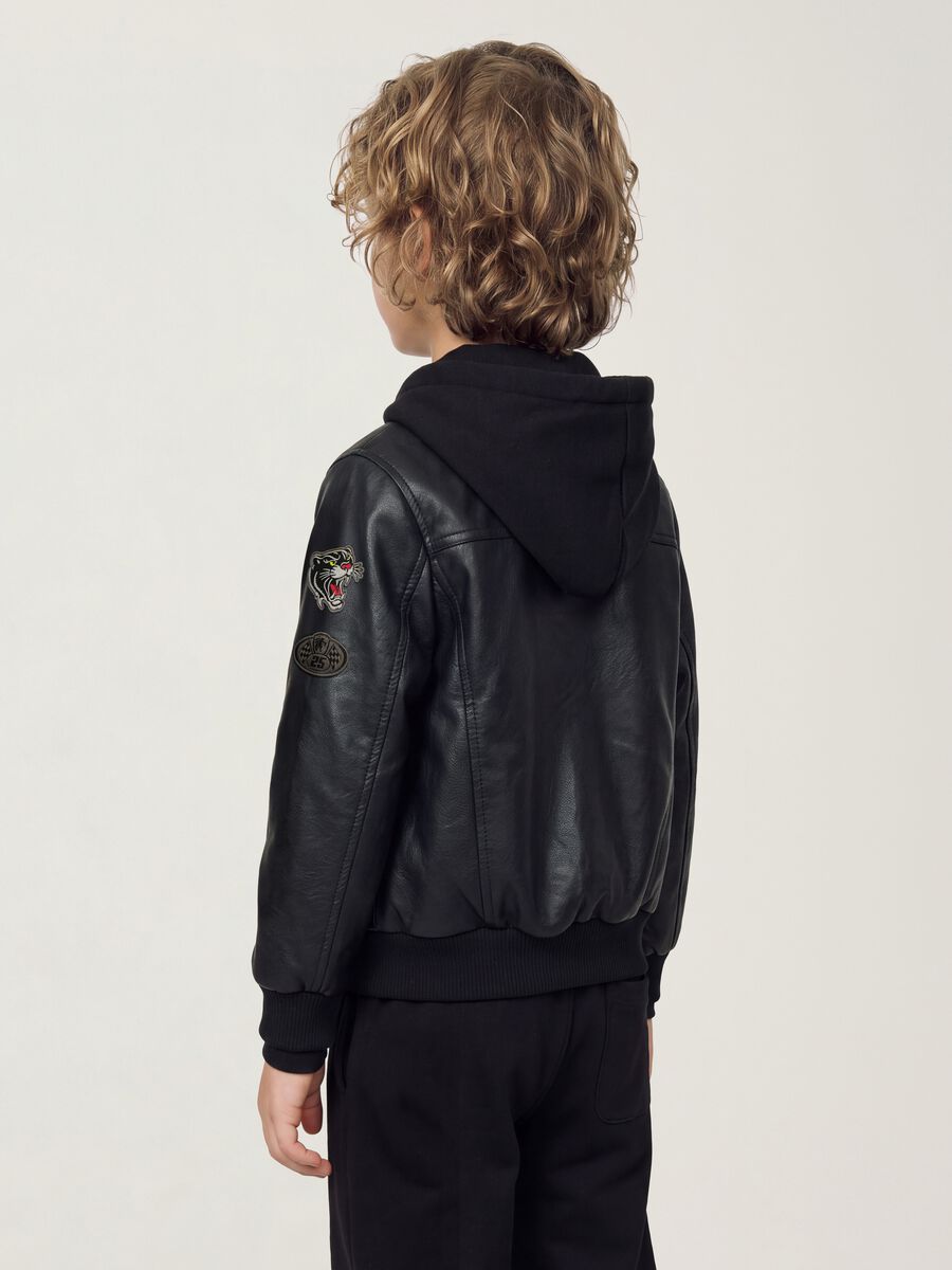 Black padded hooded zip-up jacket for boys_3