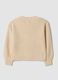 Cardigan beige in maglia con scollo profondo a V_1