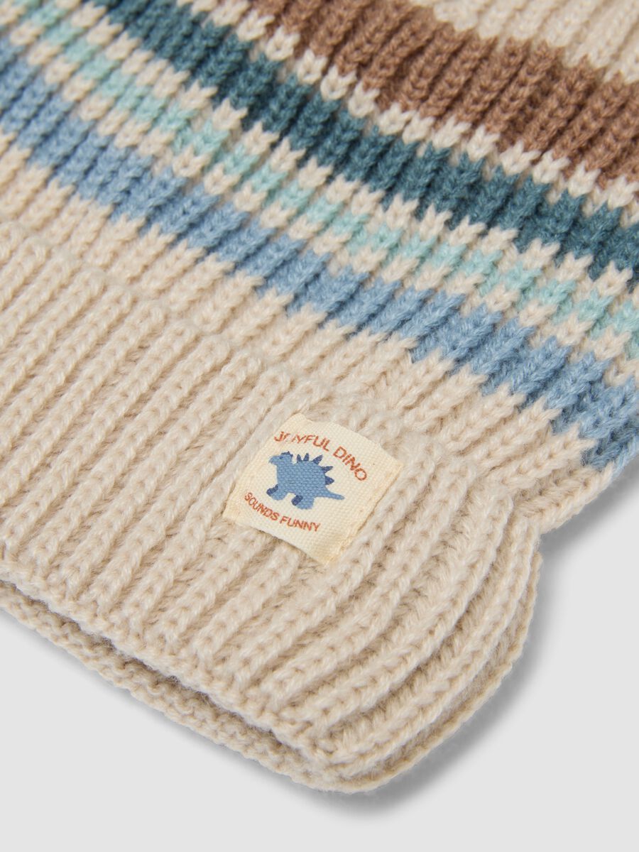 Beige striped knitted hat with turn-up cuff_1