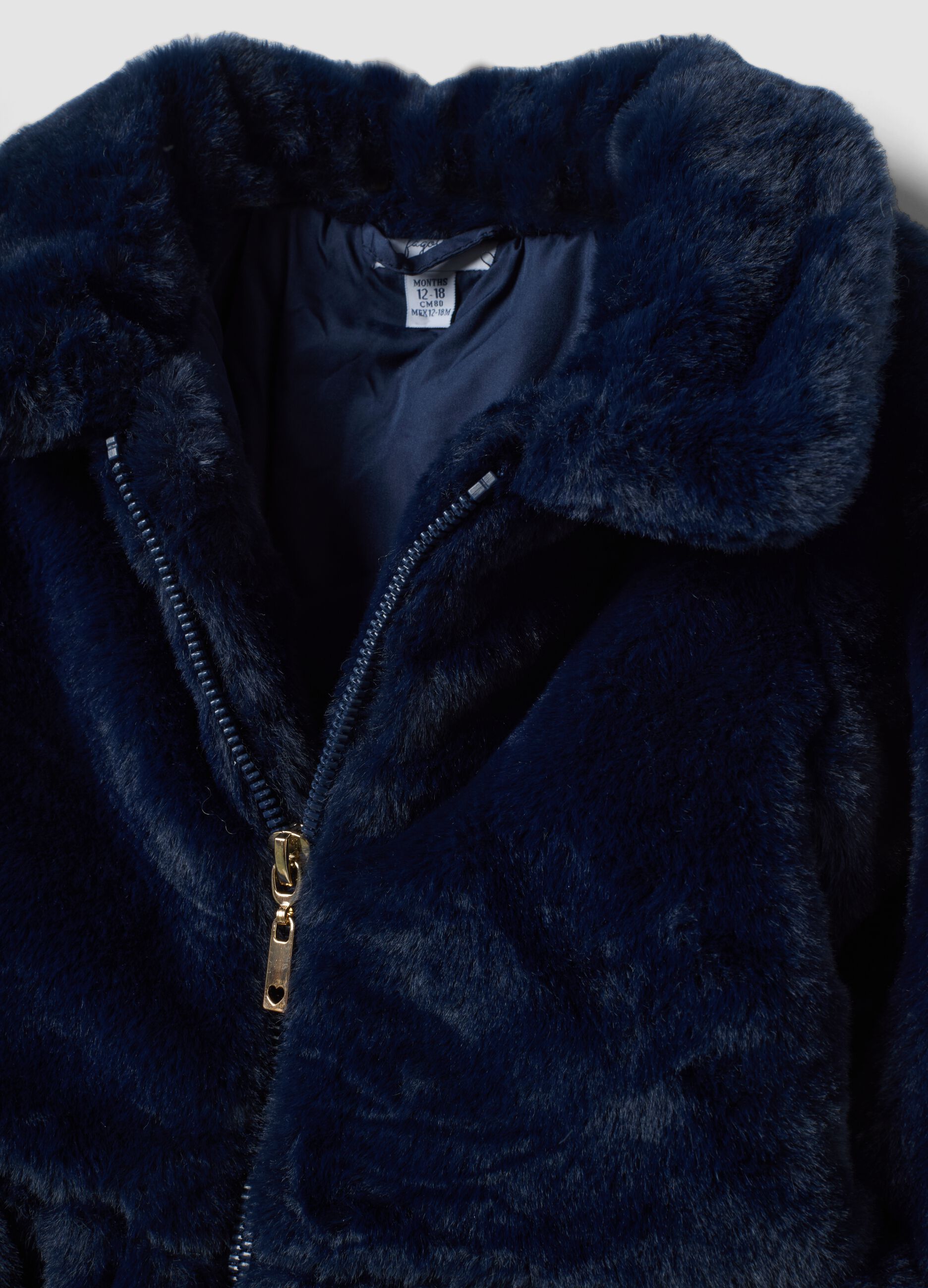 Giacca blu imbottita effetto peluche con zip