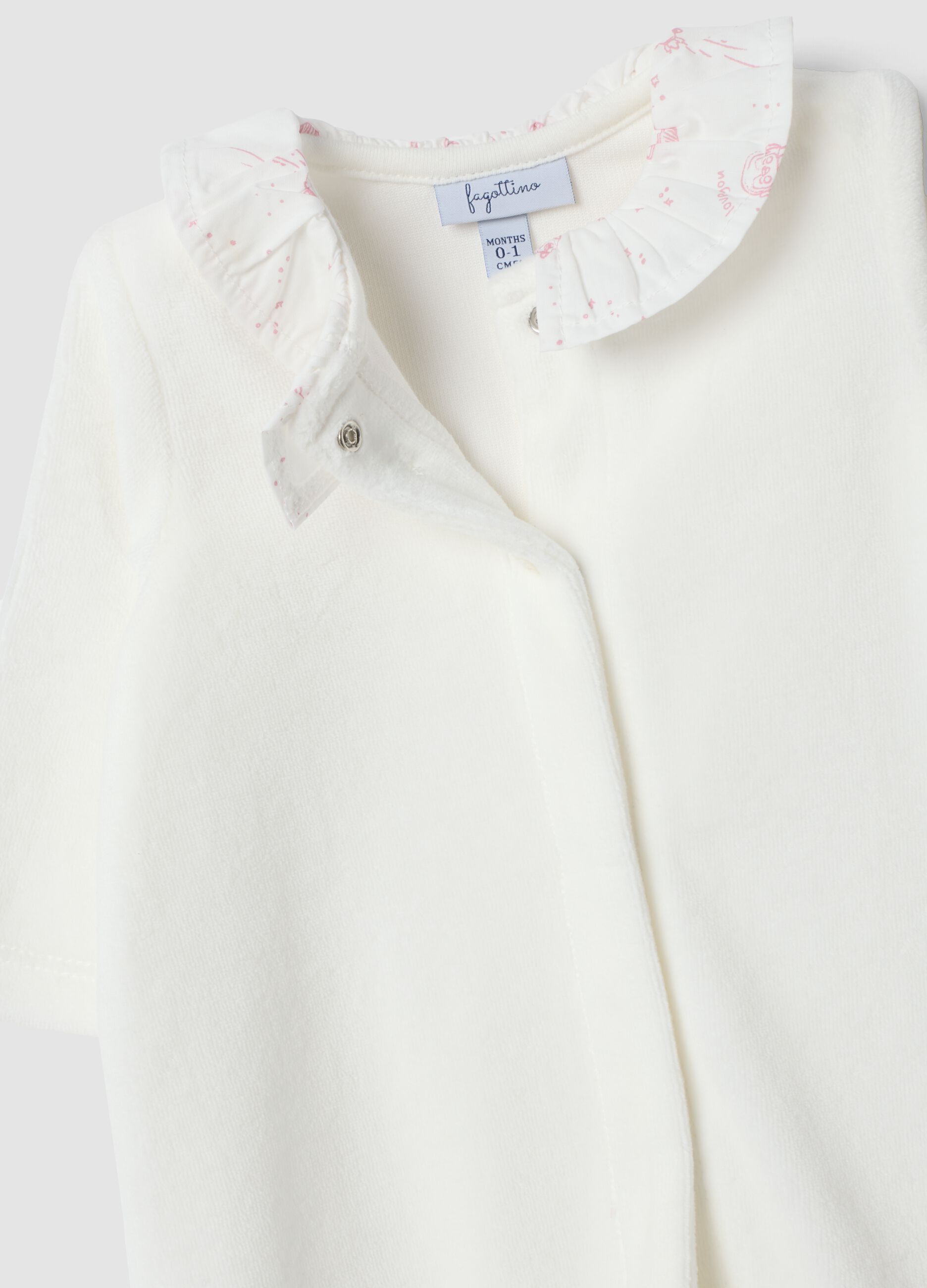 Tutina bianca in misto cotone organico con colletto