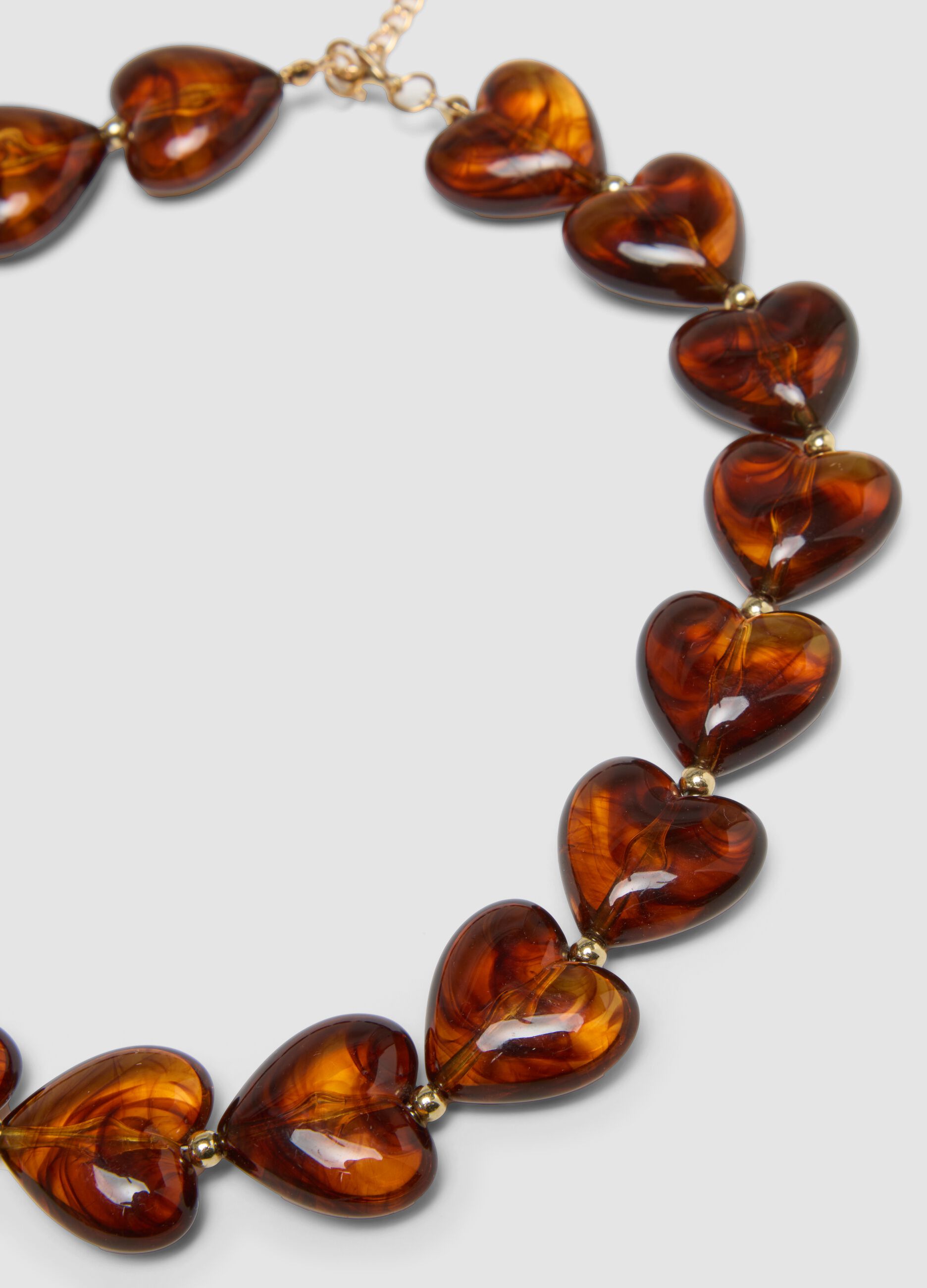 Orange necklace with marbled-effect hearts