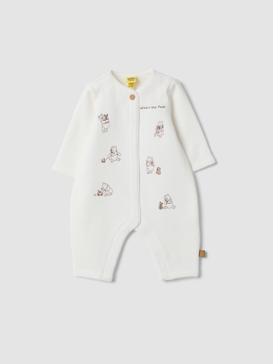 Off-white organic cotton sleepsuit with Winnie the Pooh print_0